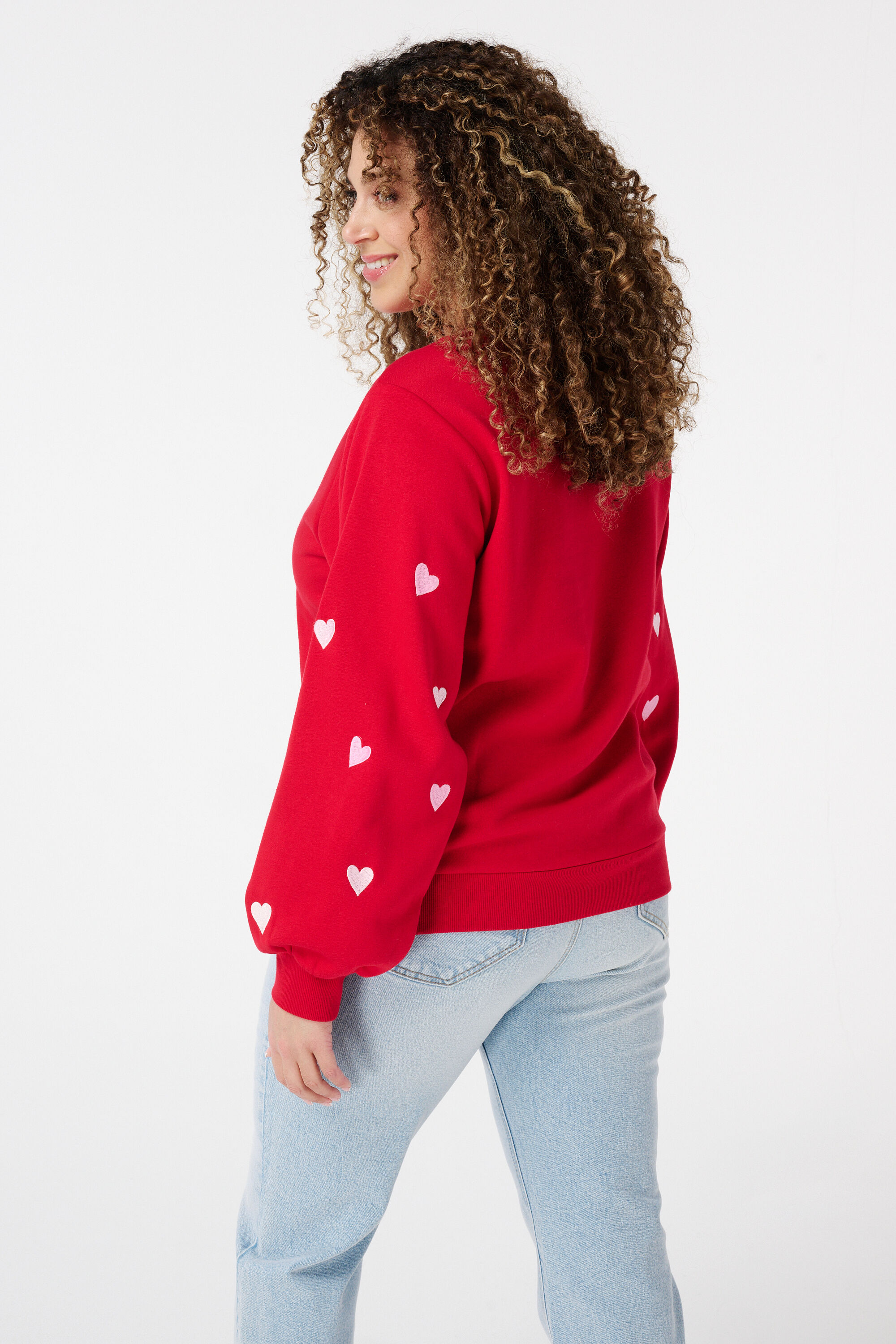 Su&eacute;ter con patr&oacute;n de corazones image number 3