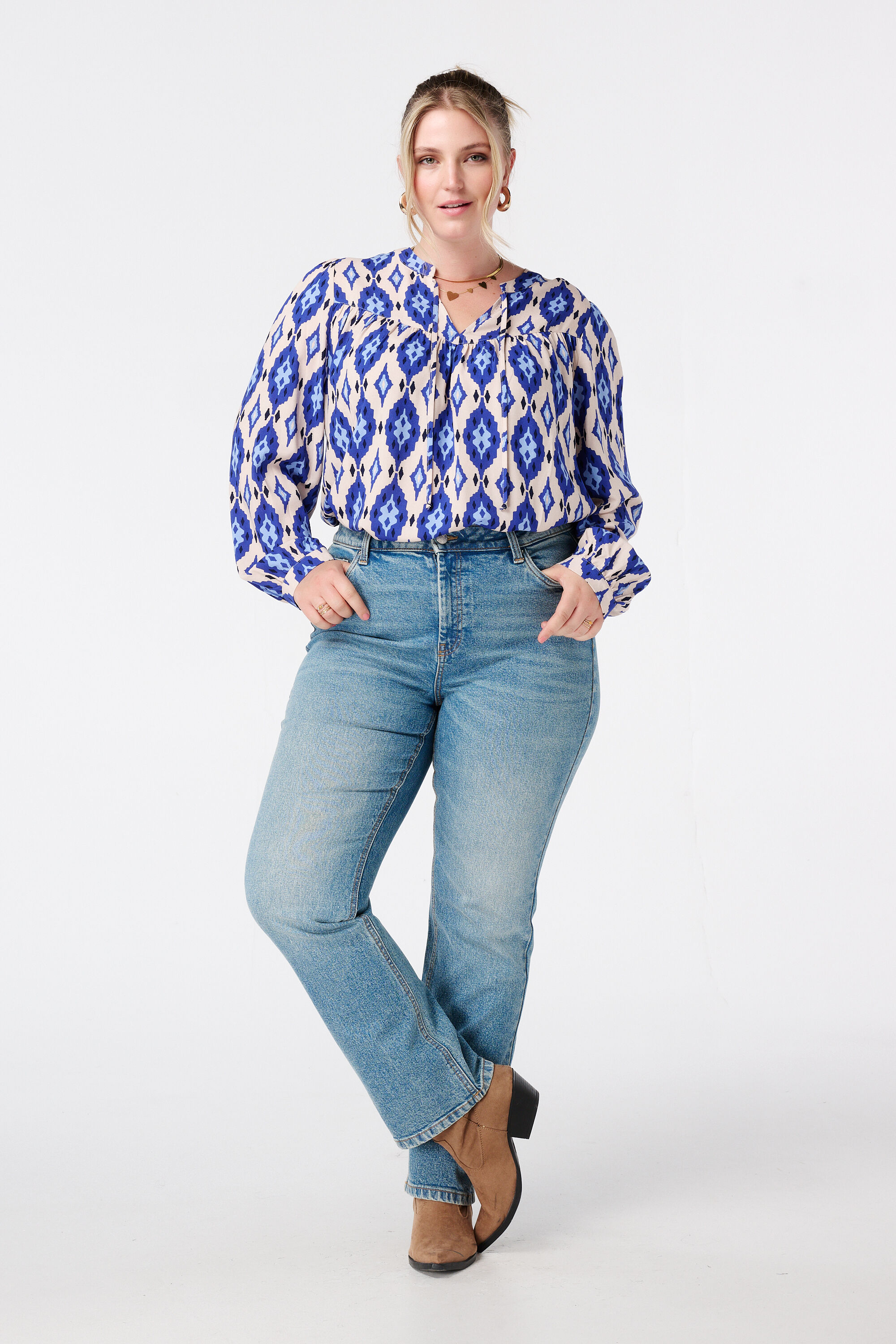 Blusa con estampado y bobinas image number 5