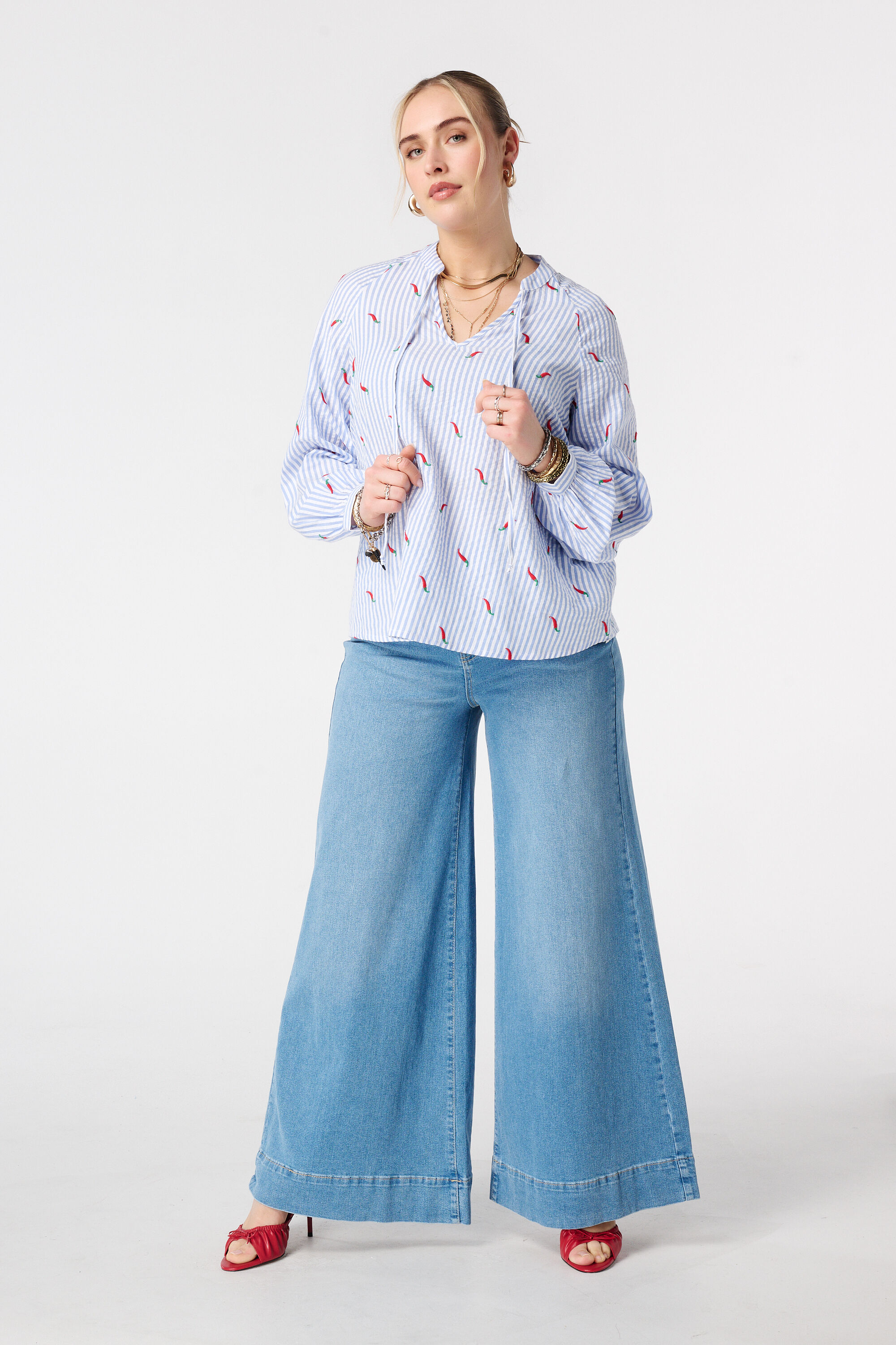 Blusa de rayas con estampado image number 5