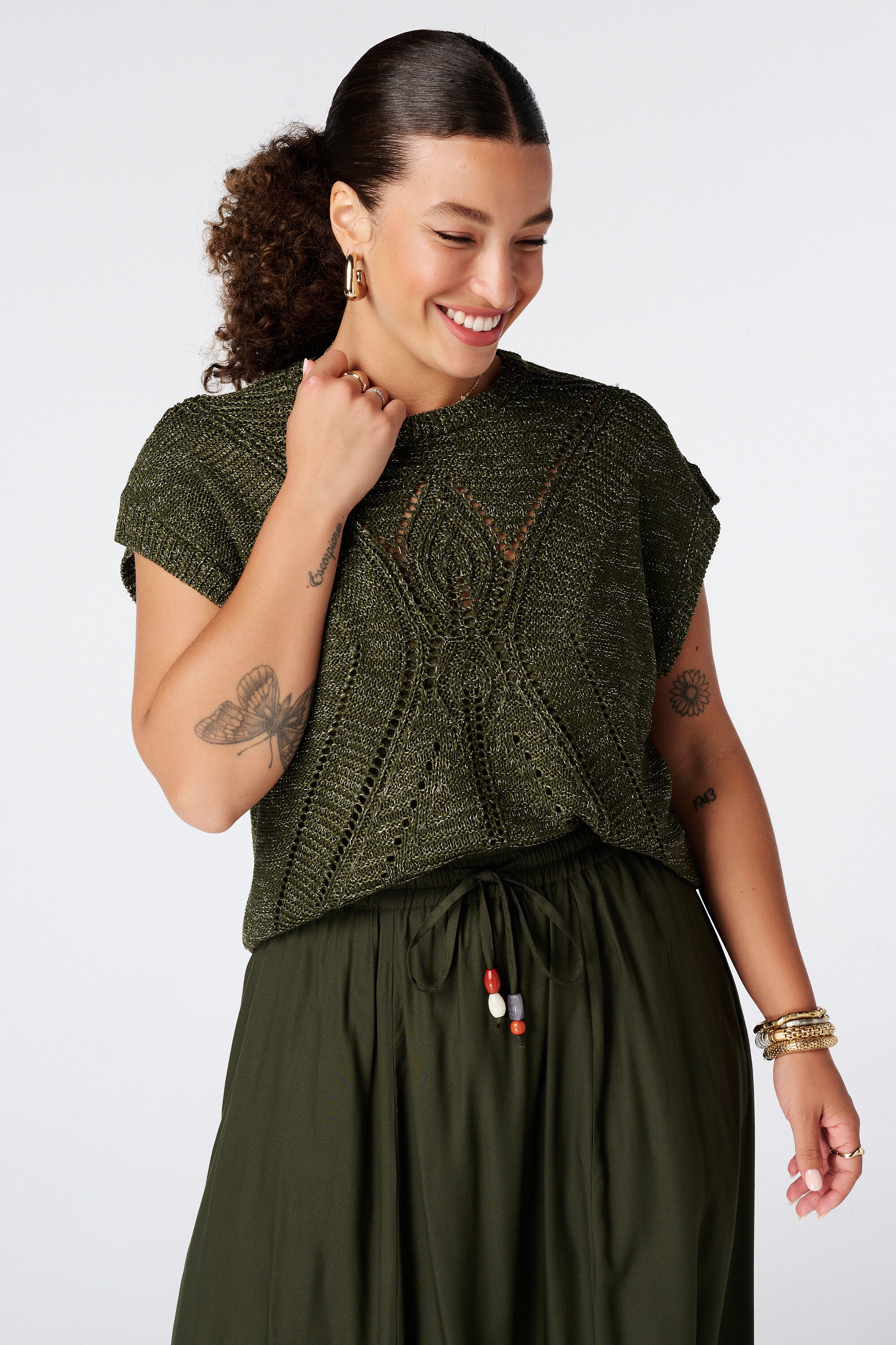 Jersey de crochet con mangas cortas