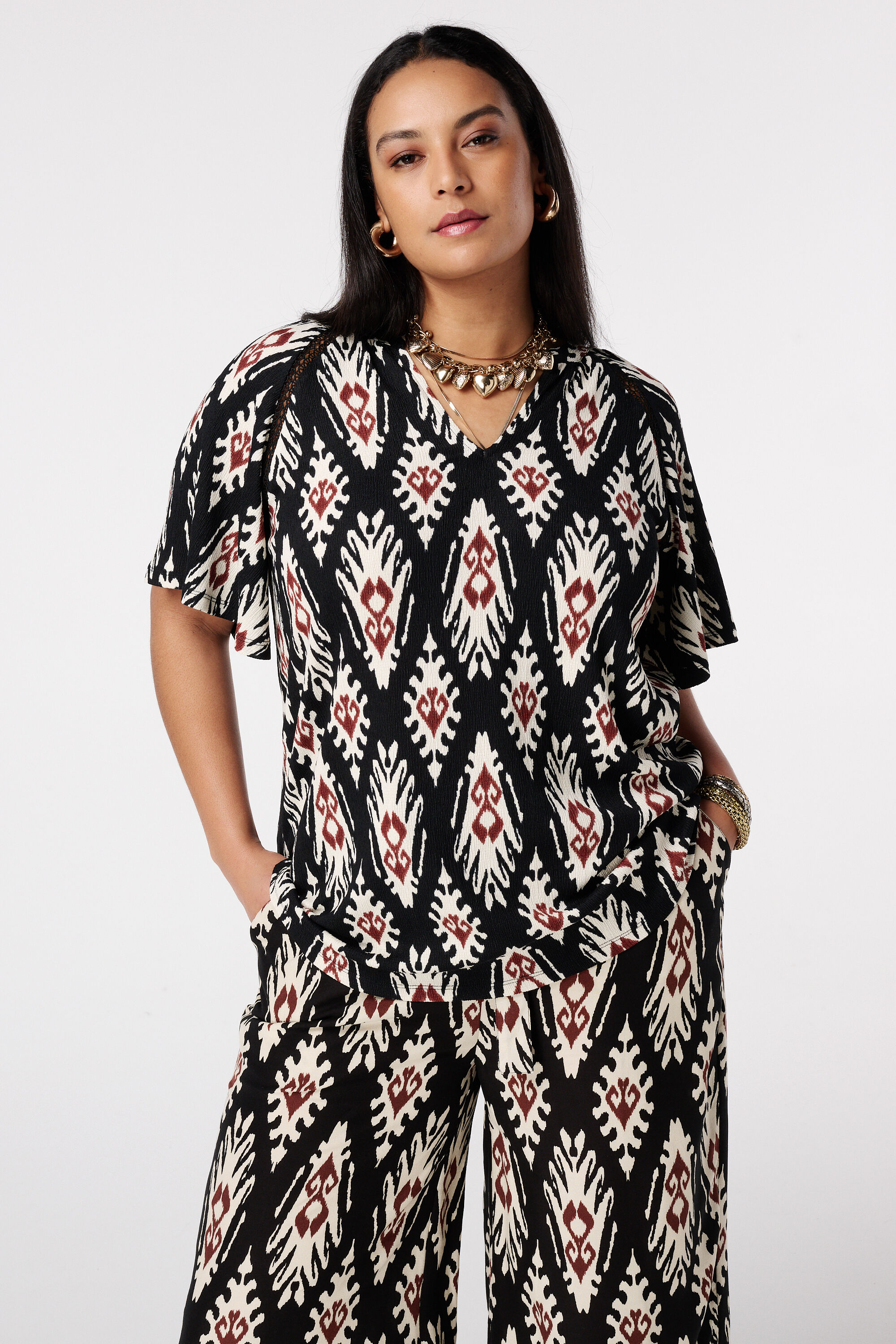 Top con mangas mariposa