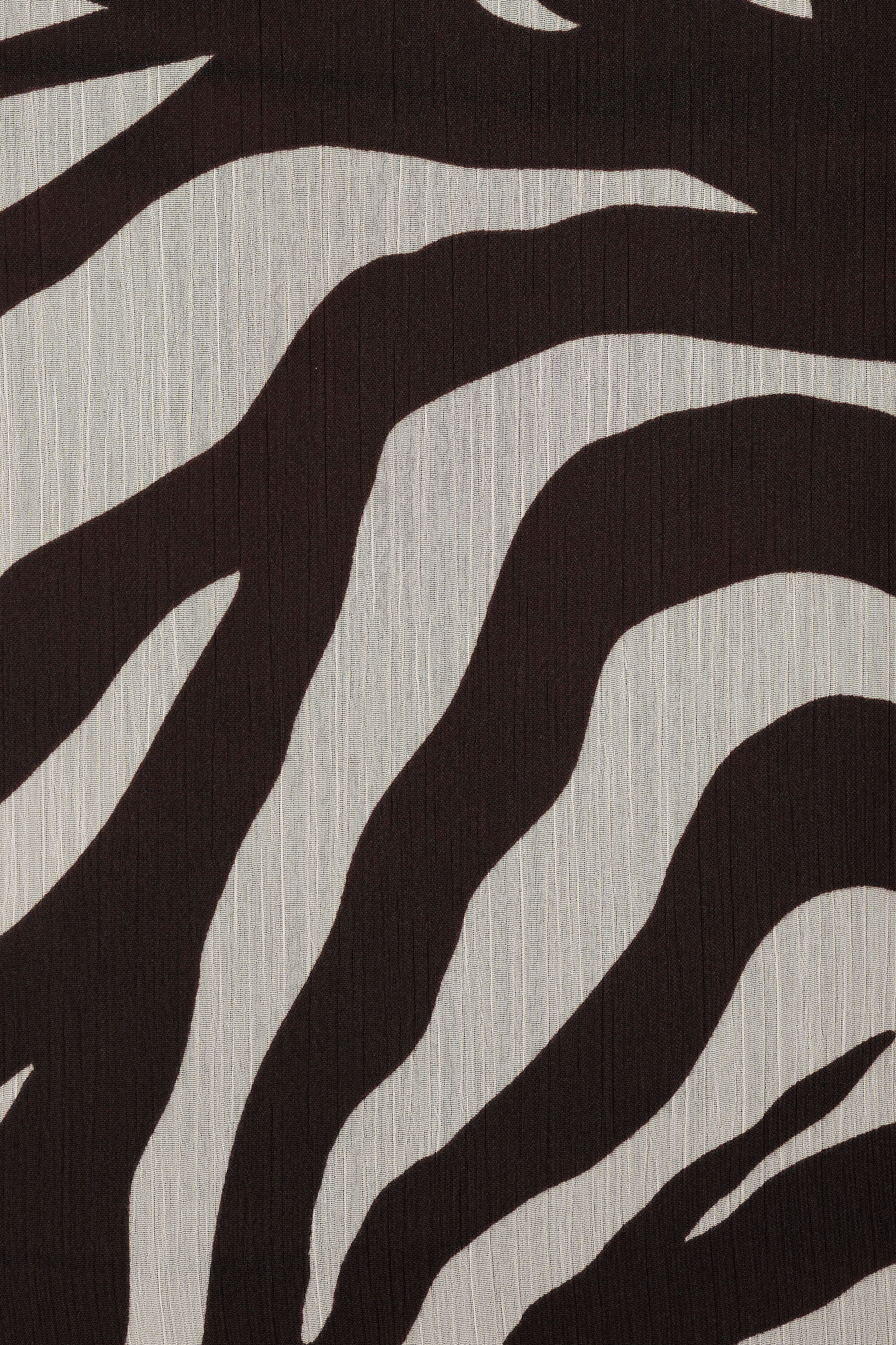 Blusa con estampado animal image number 6