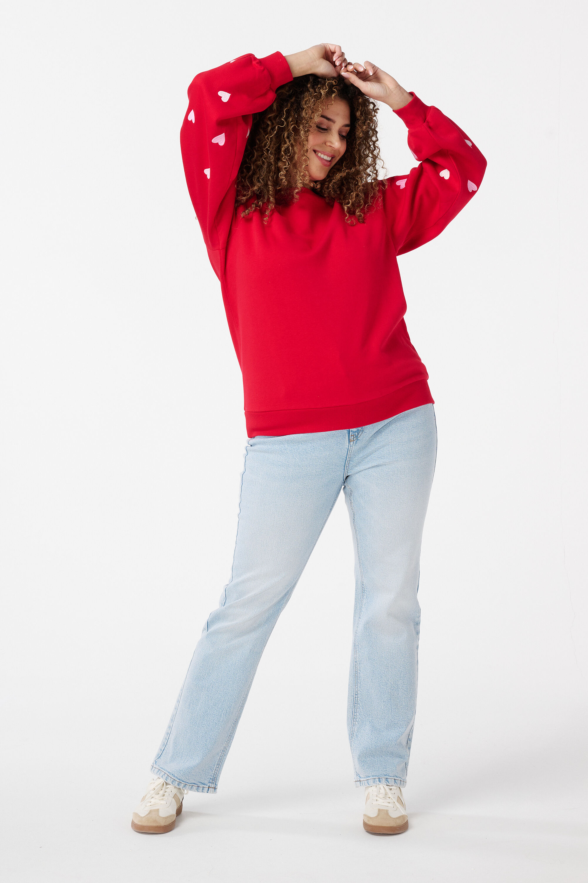 Su&eacute;ter con patr&oacute;n de corazones image number 5