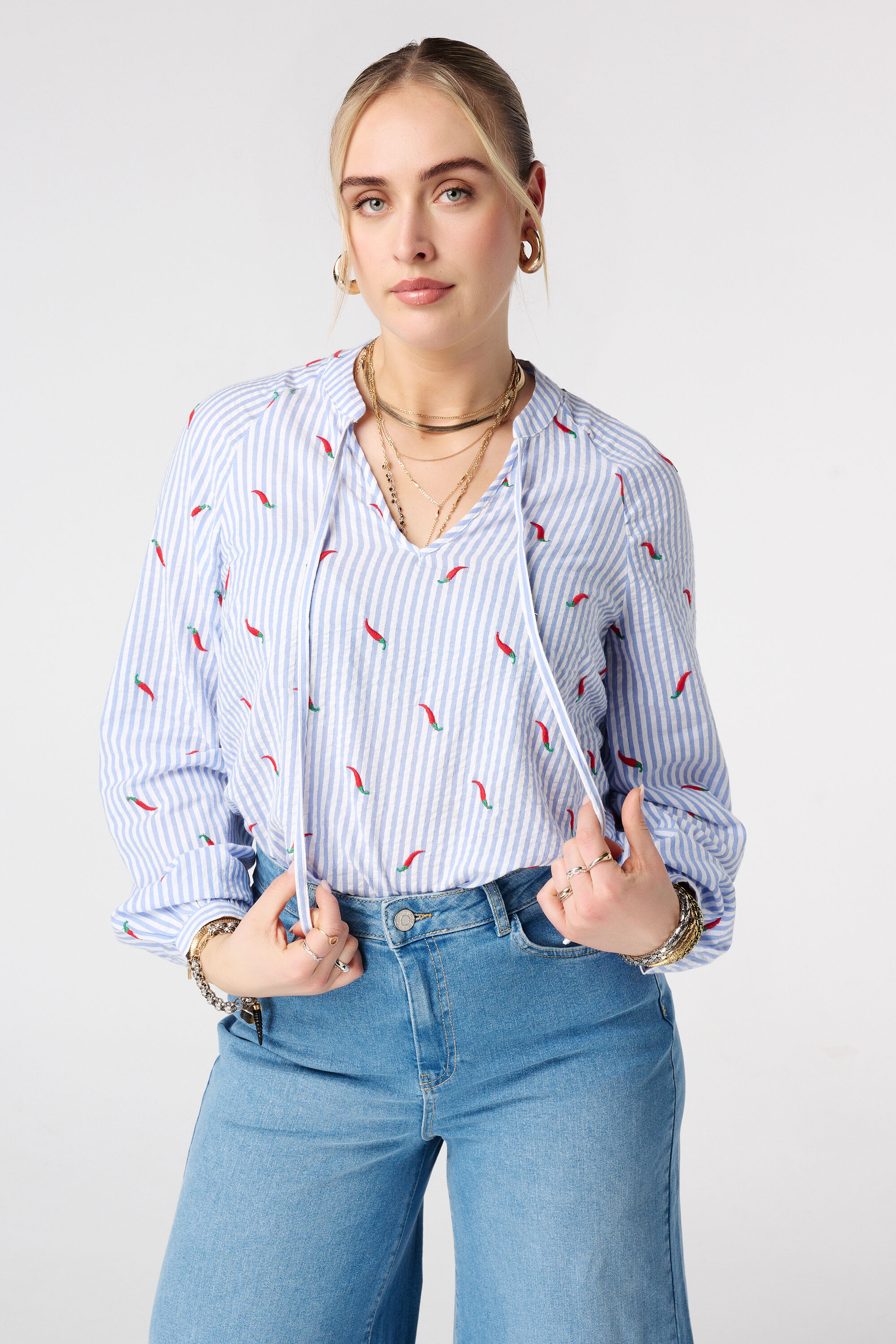 Blusa de rayas con estampado
