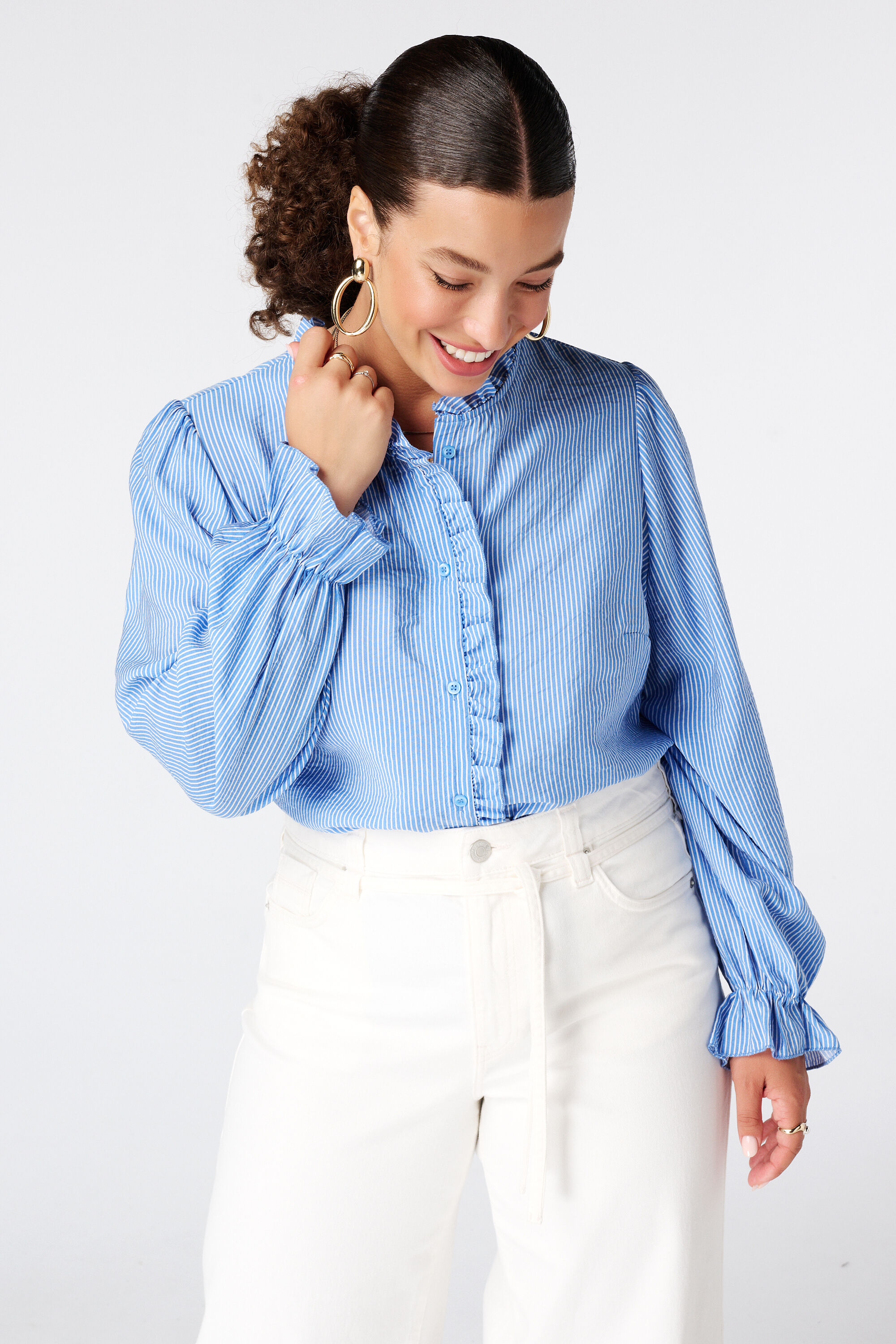 Blusa con volantes