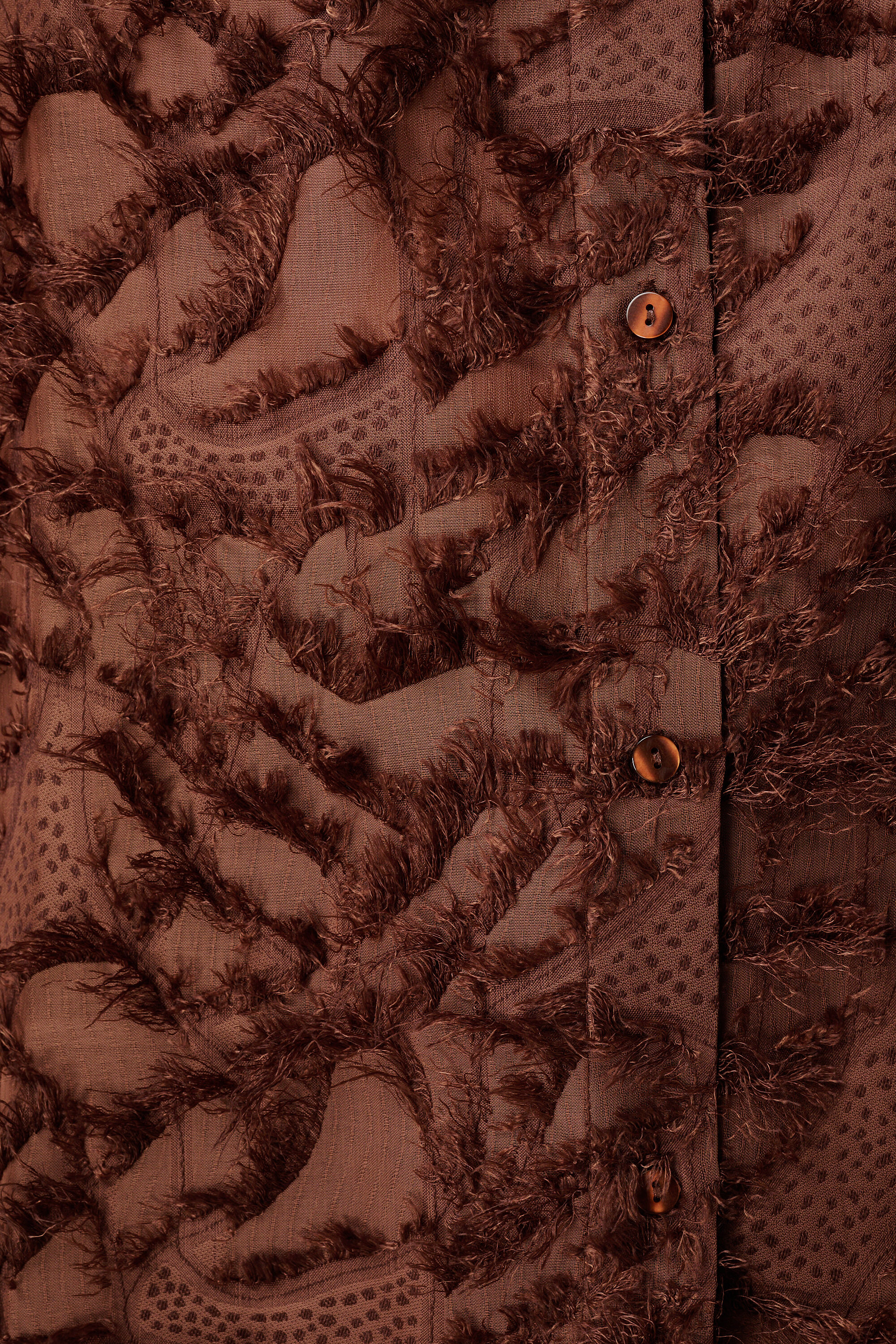 Blusa mullida con estampado image number 6