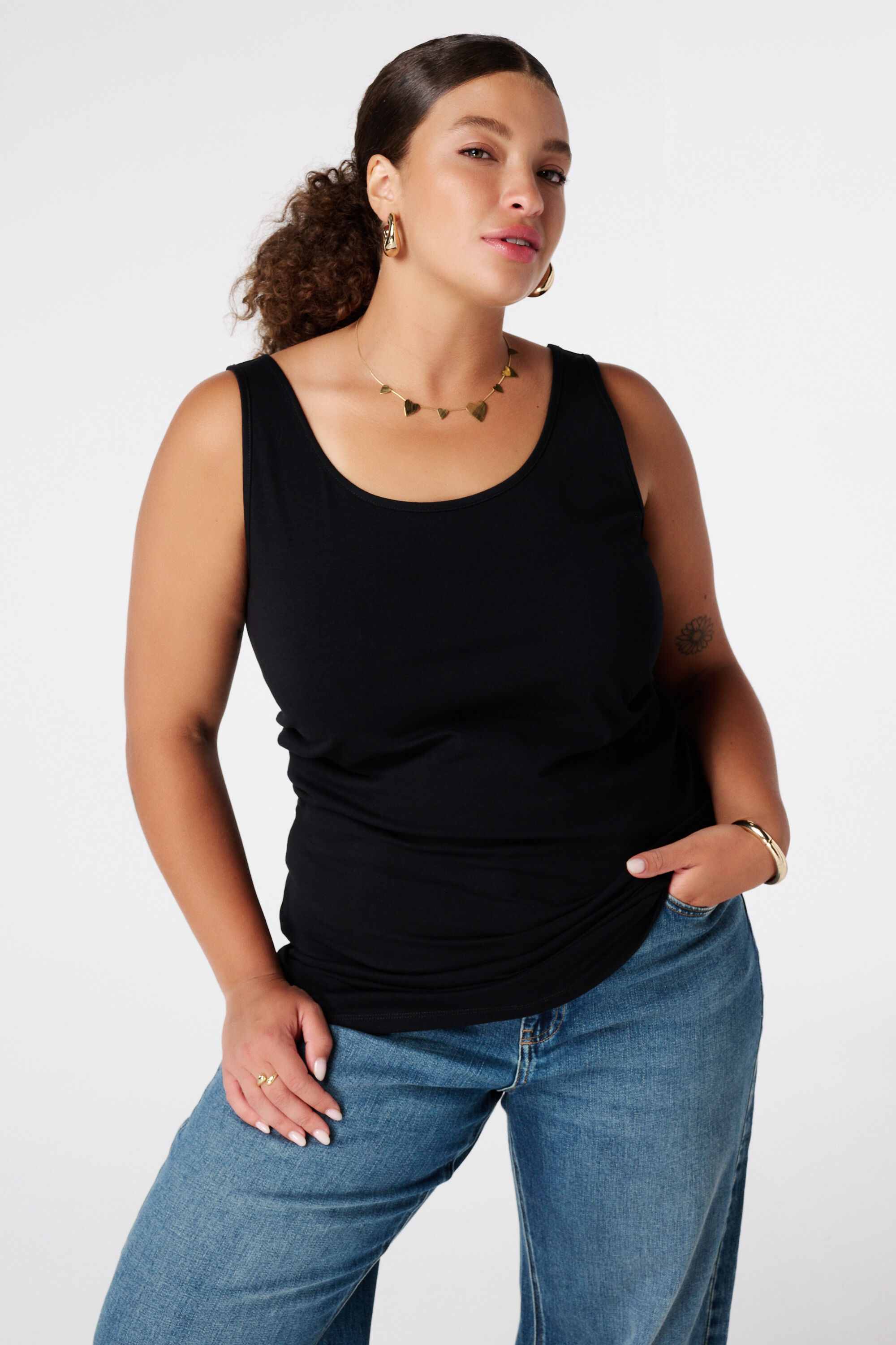 Camiseta extra larga sin mangas de algod&oacute;n