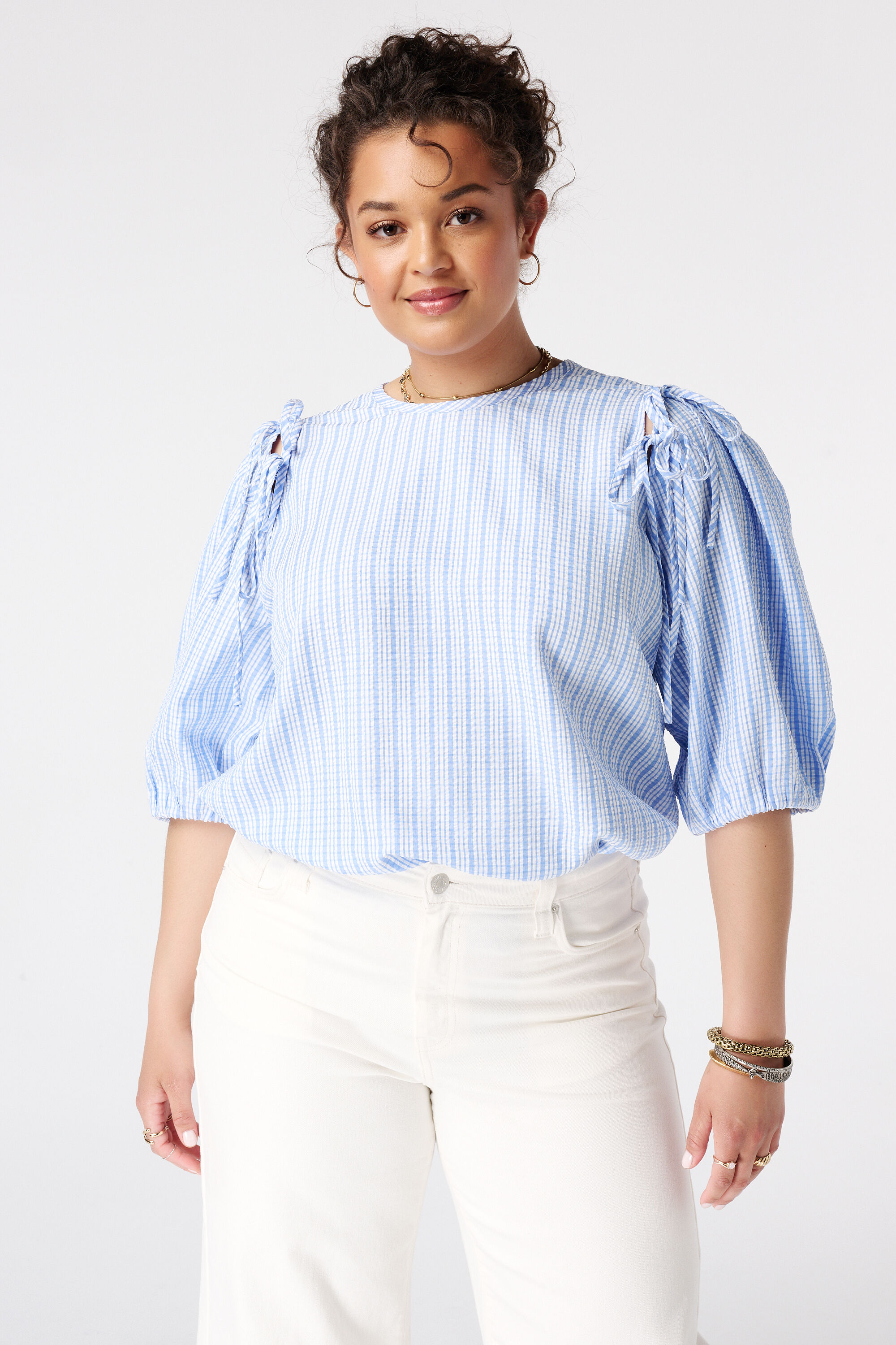 Blusa de cuadros con mangas abullonadas