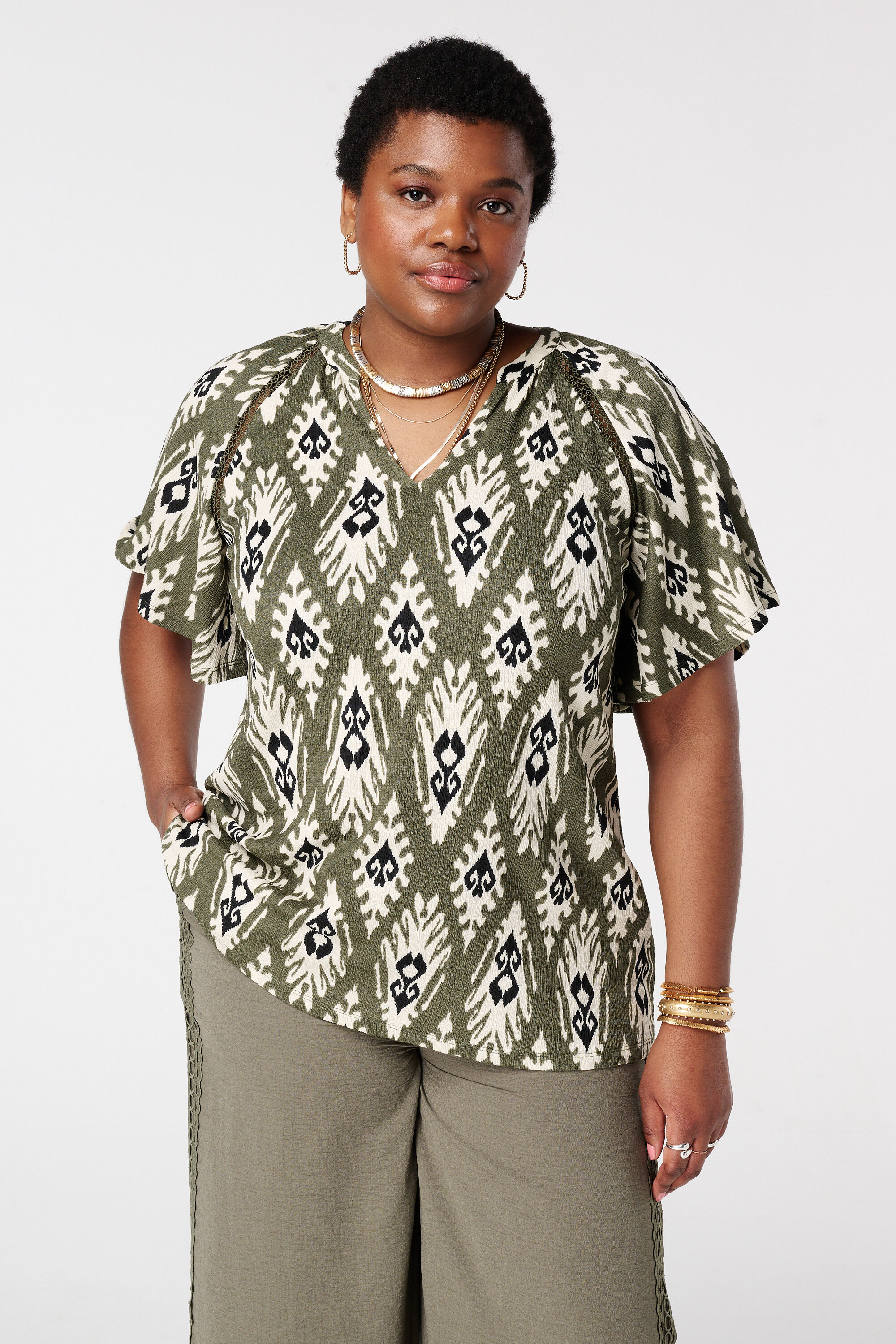 Top con mangas mariposa