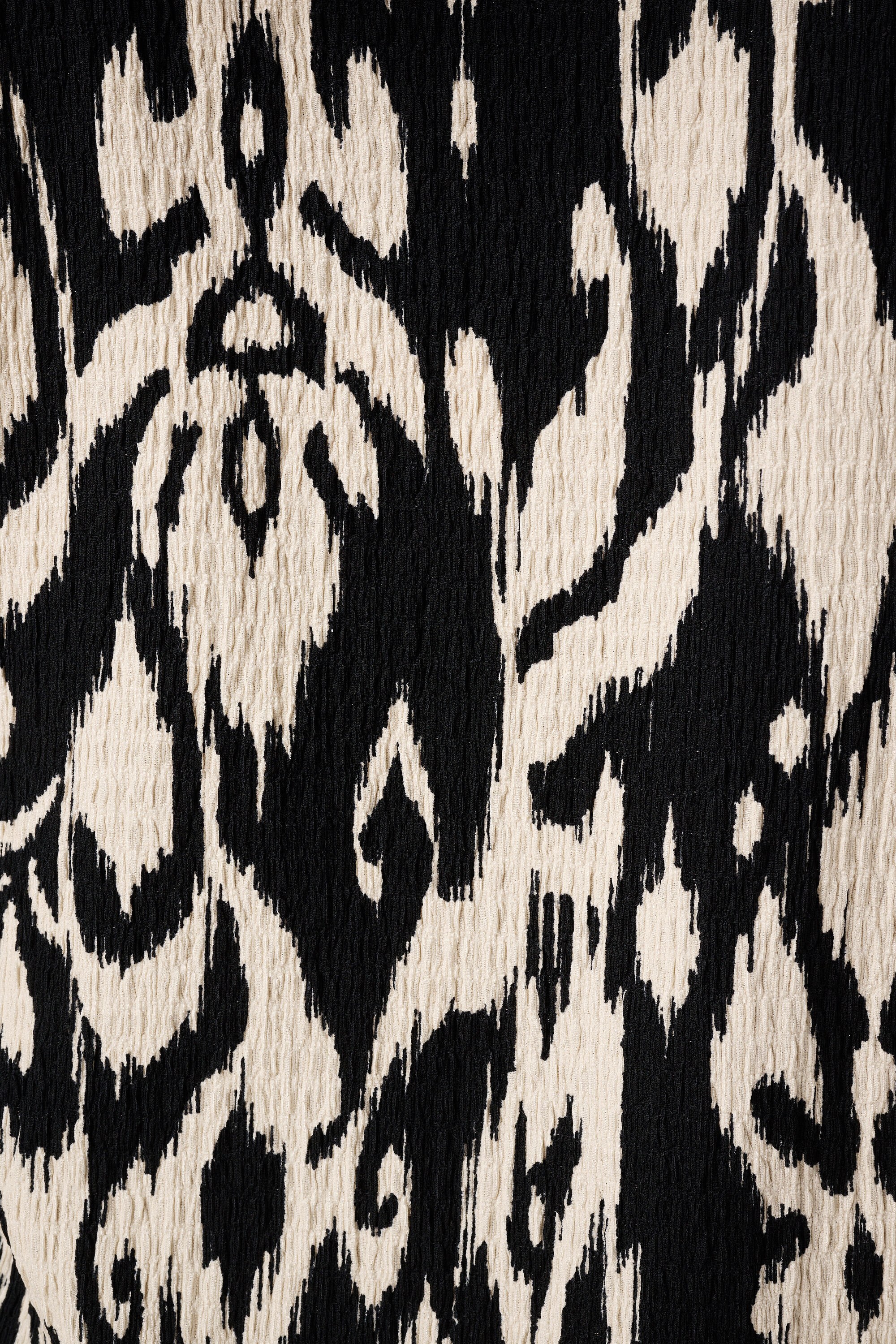 Top con textura y manga casquillo image number 6