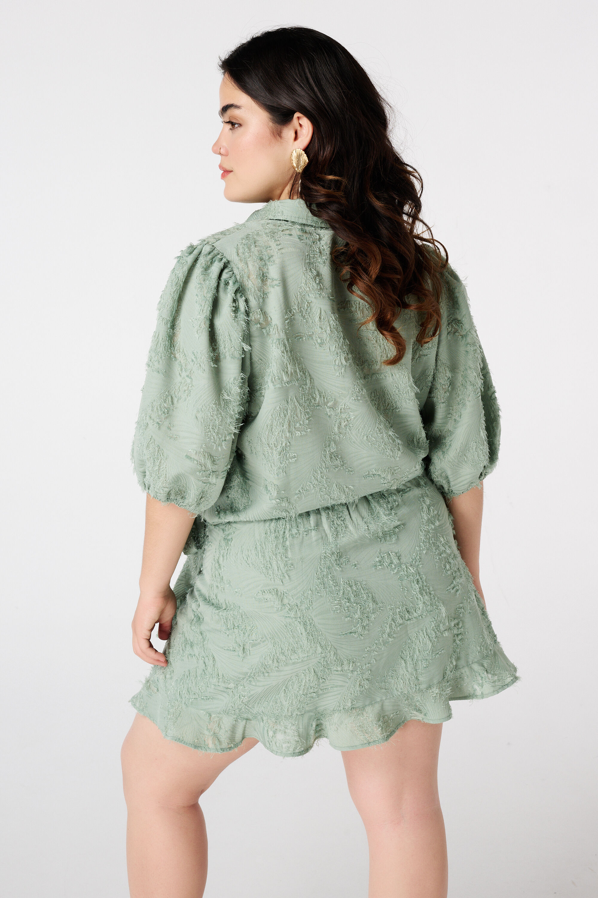 Blusa con textura y mangas globo image number 3