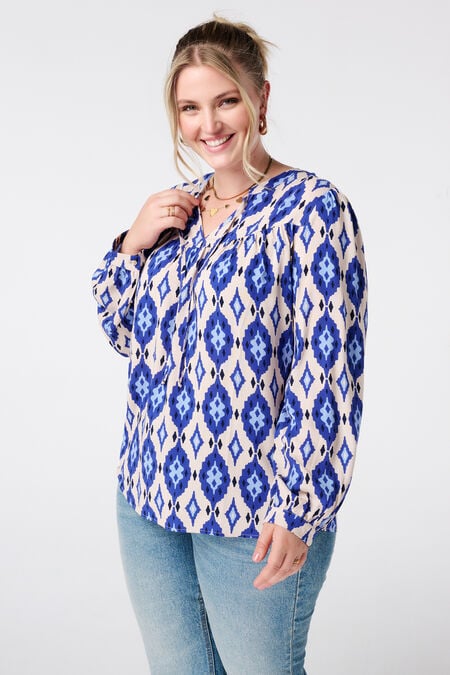 Blusa con estampado y bobinas Blusa con estampado y bobinas