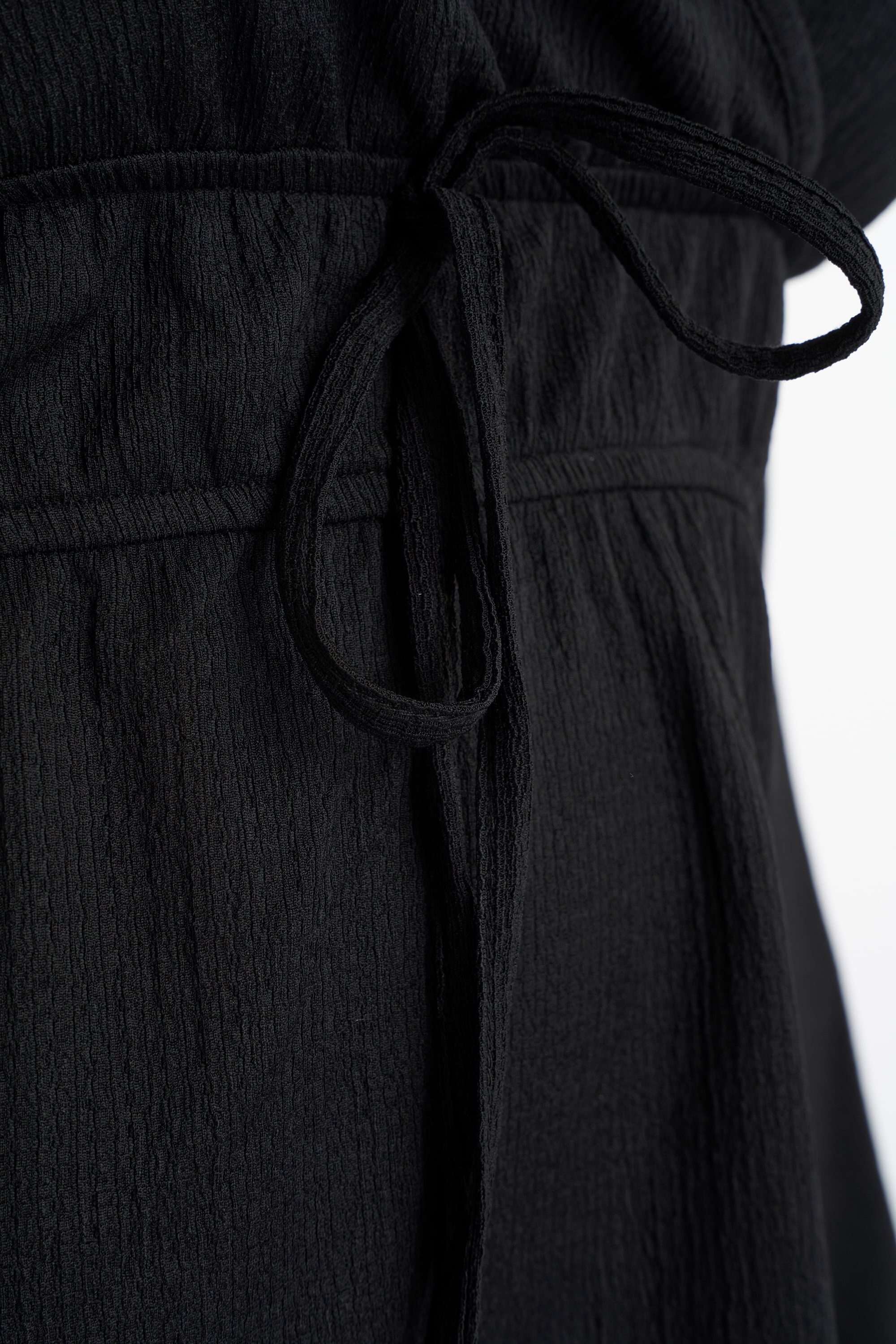 Top cruzado con mangas abullonadas image number 5