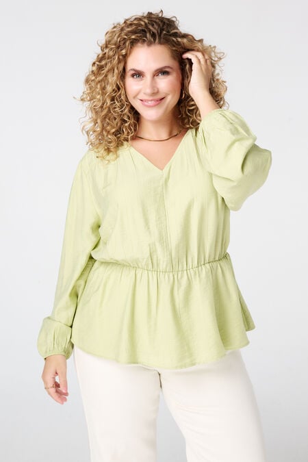 Blusa con efecto peplum Blusa con efecto peplum
