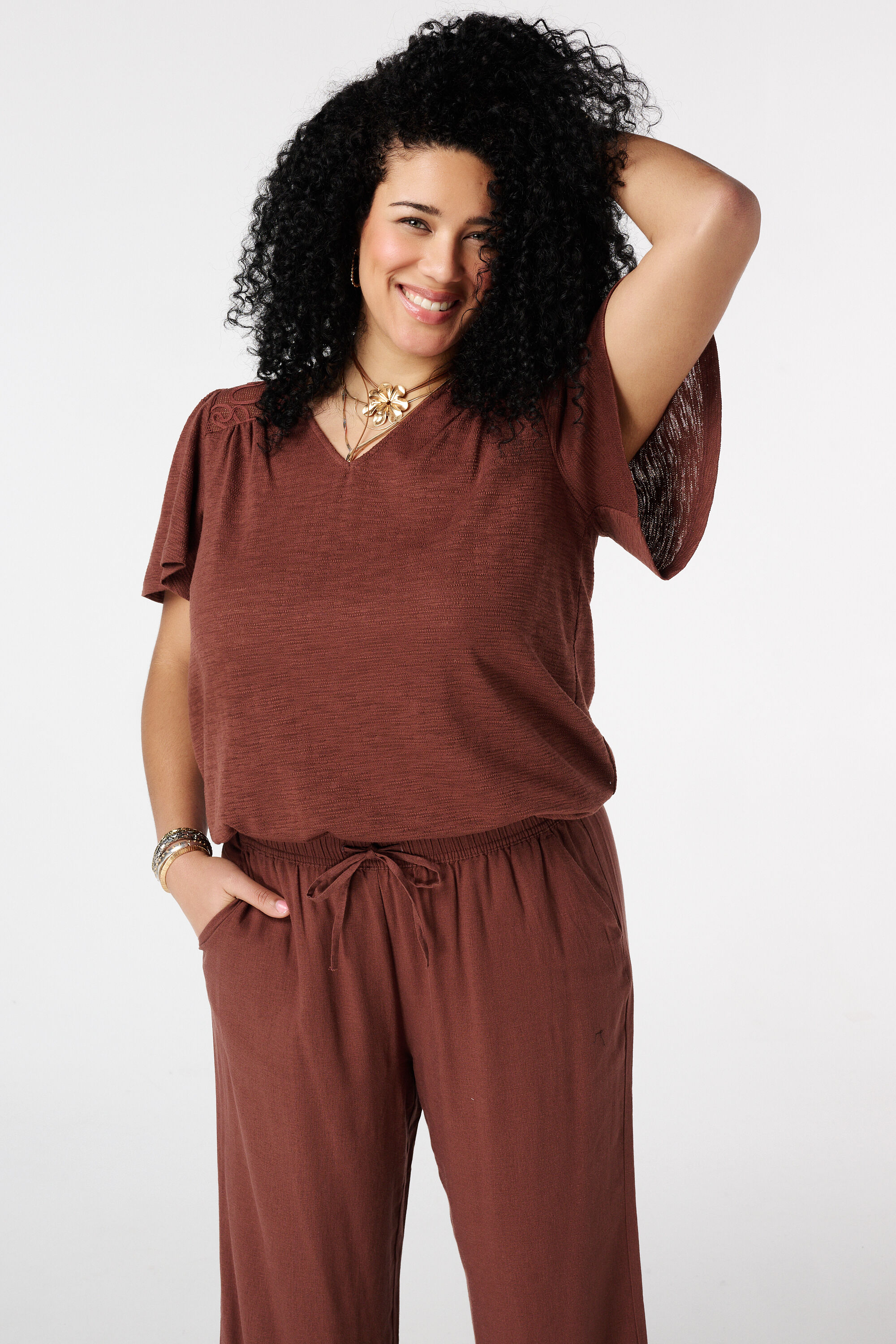 Top con mangas mariposa