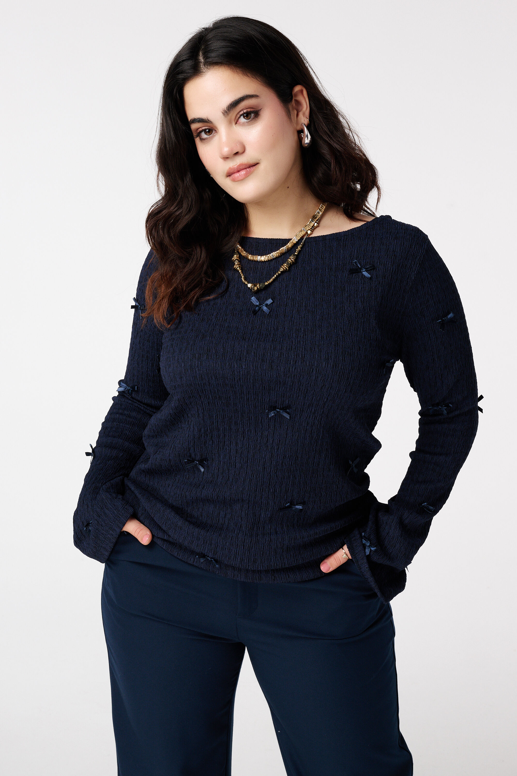 Top con detalles de lazos