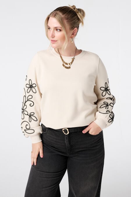 Jersey con detalles bordados Jersey con detalles bordados
