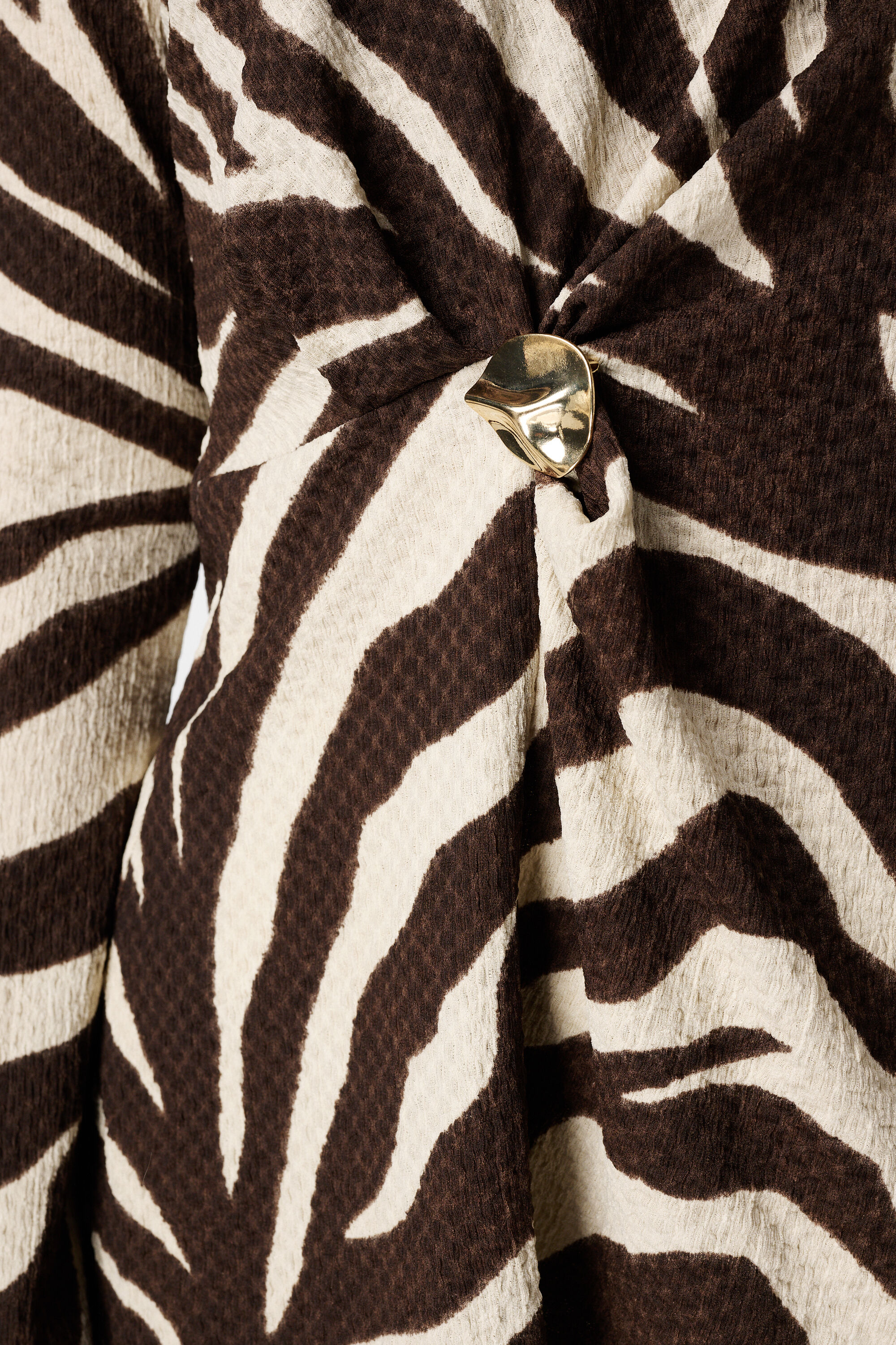 Top con bot&oacute;n en la cintura image number 6