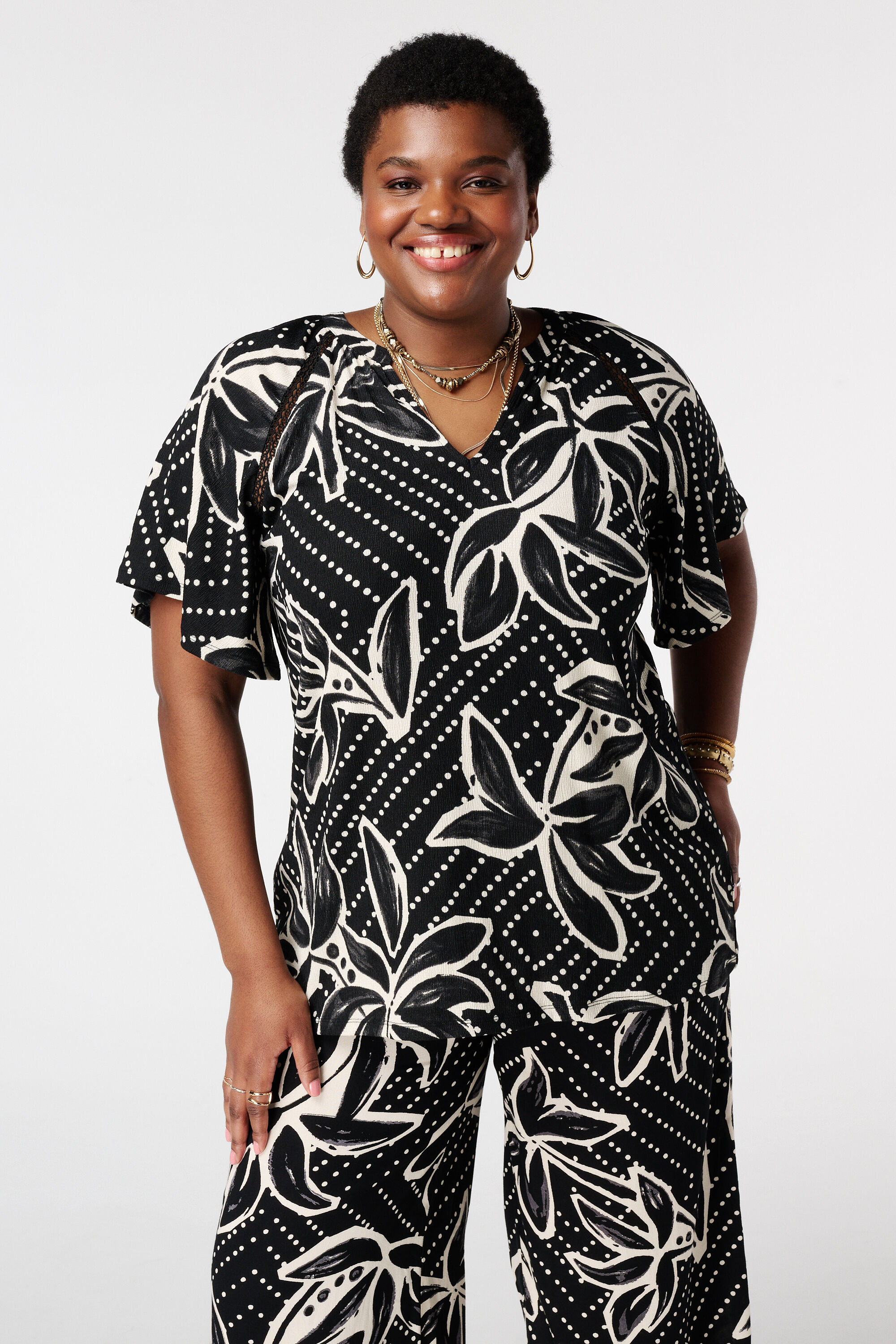 Top con mangas mariposa