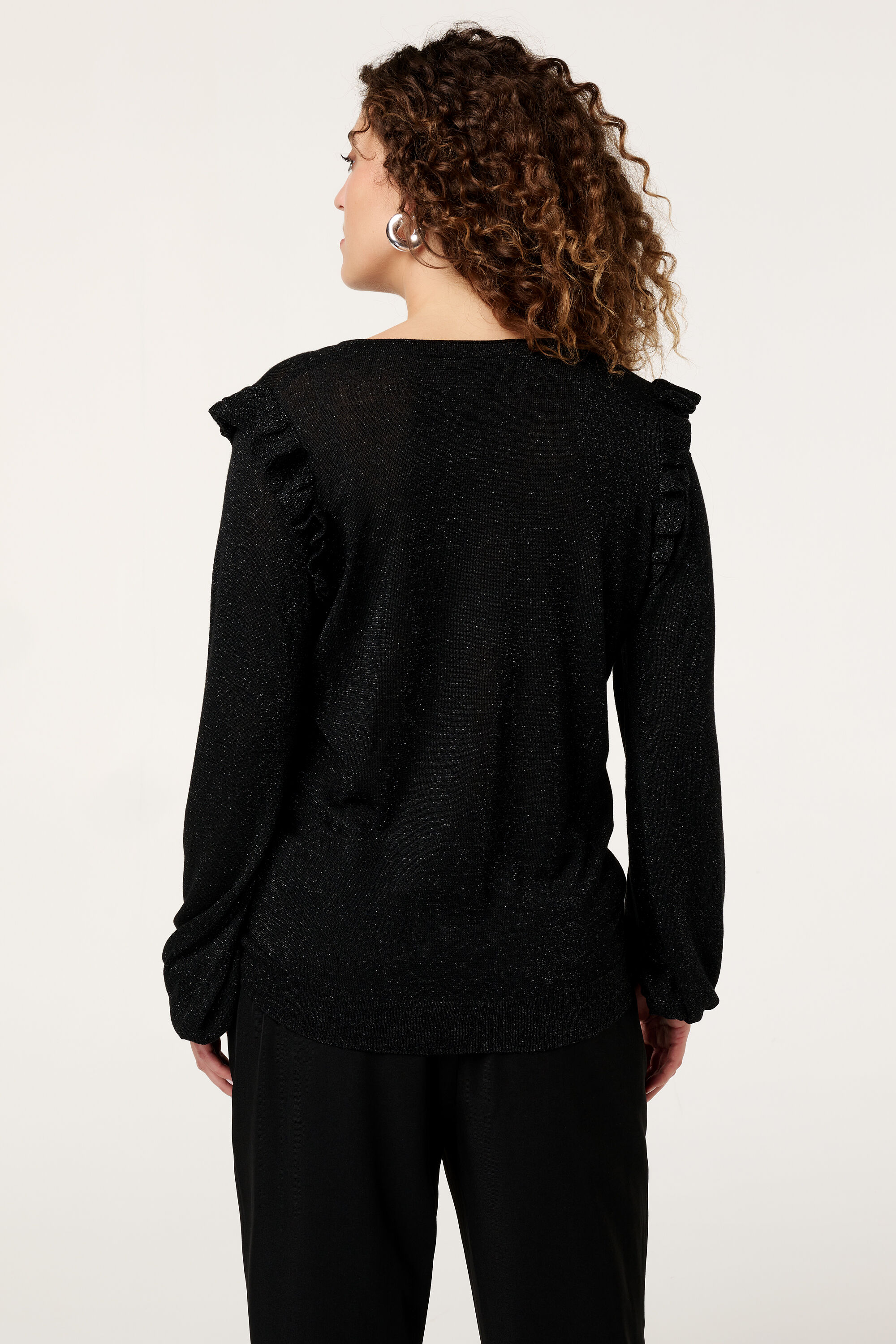 Su&eacute;ter con volantes y purpurina image number 3