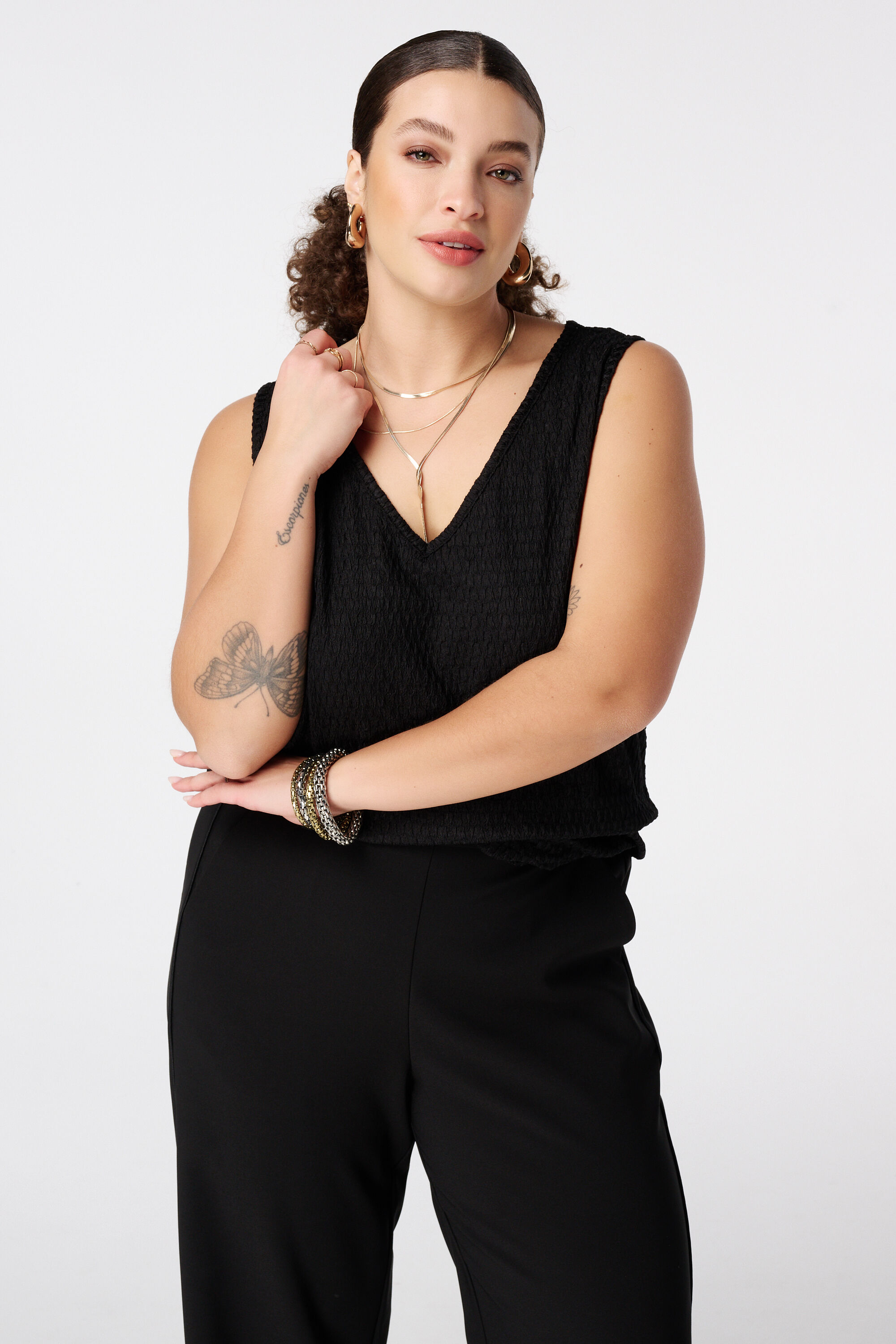 Top sin mangas con textura