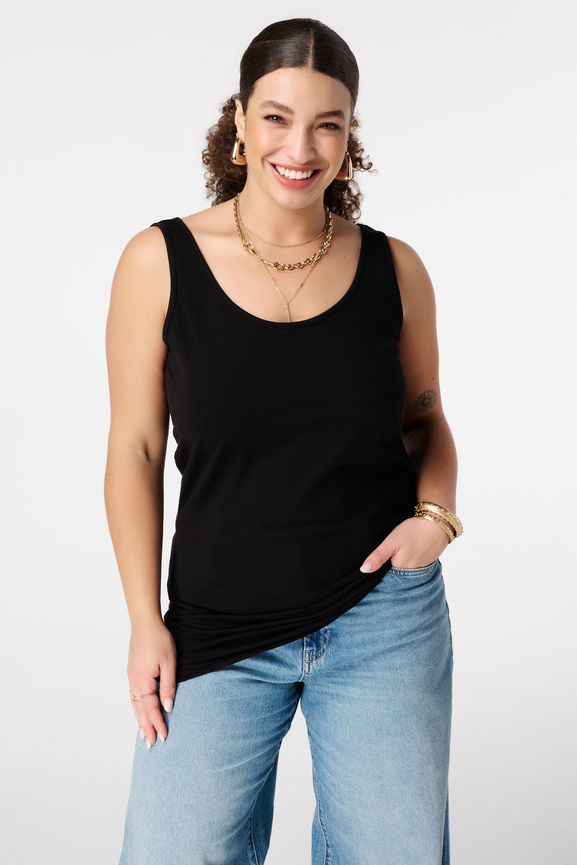 Camiseta extra larga sin mangas de algod&oacute;n