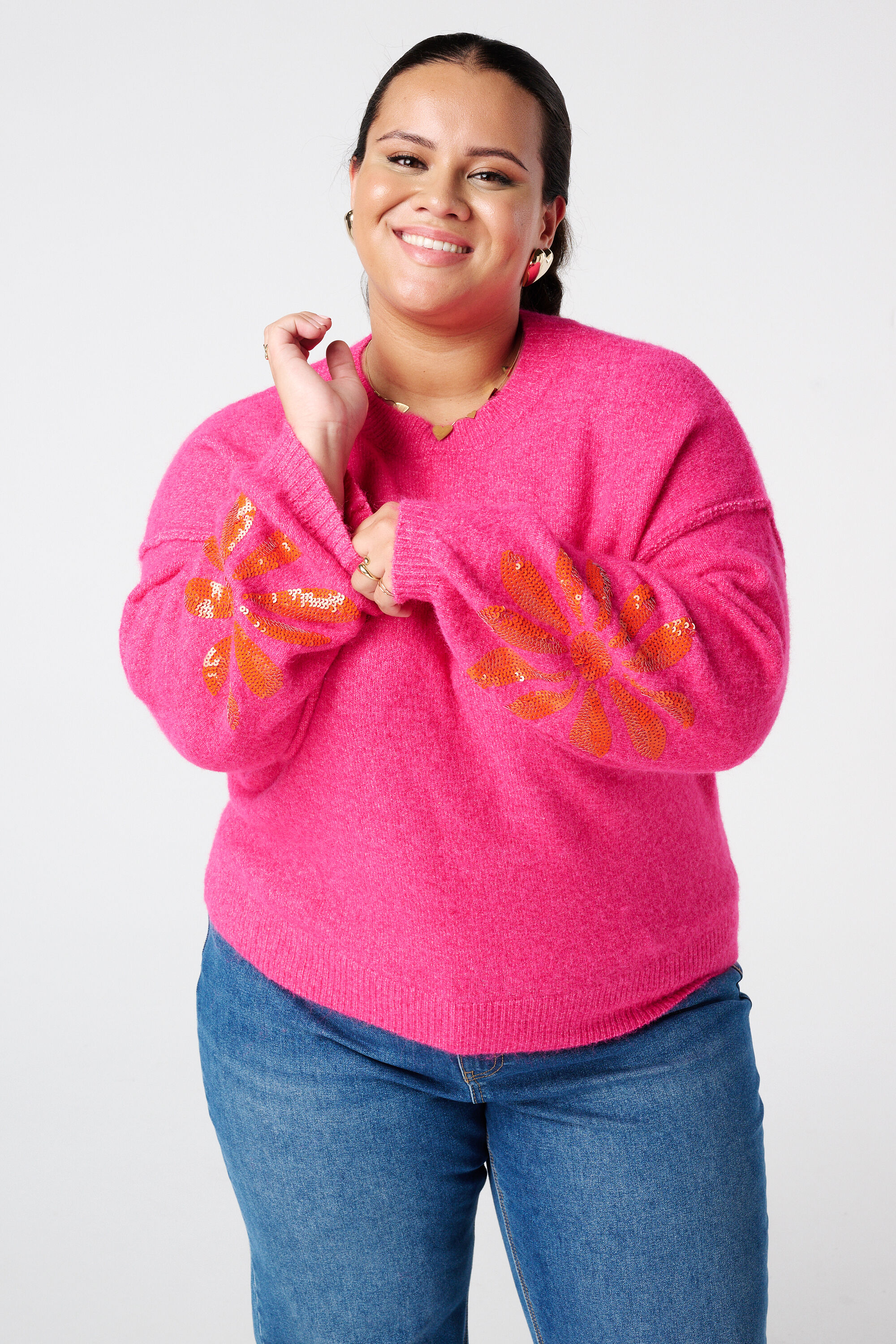 Jersey de punto con lentejuelas en las mangas