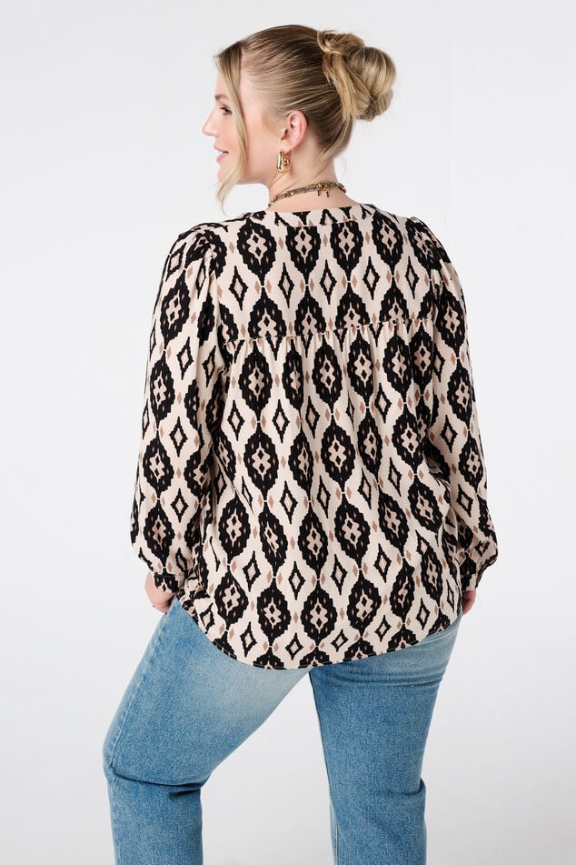 Blusa con estampado y bobinas image number 3