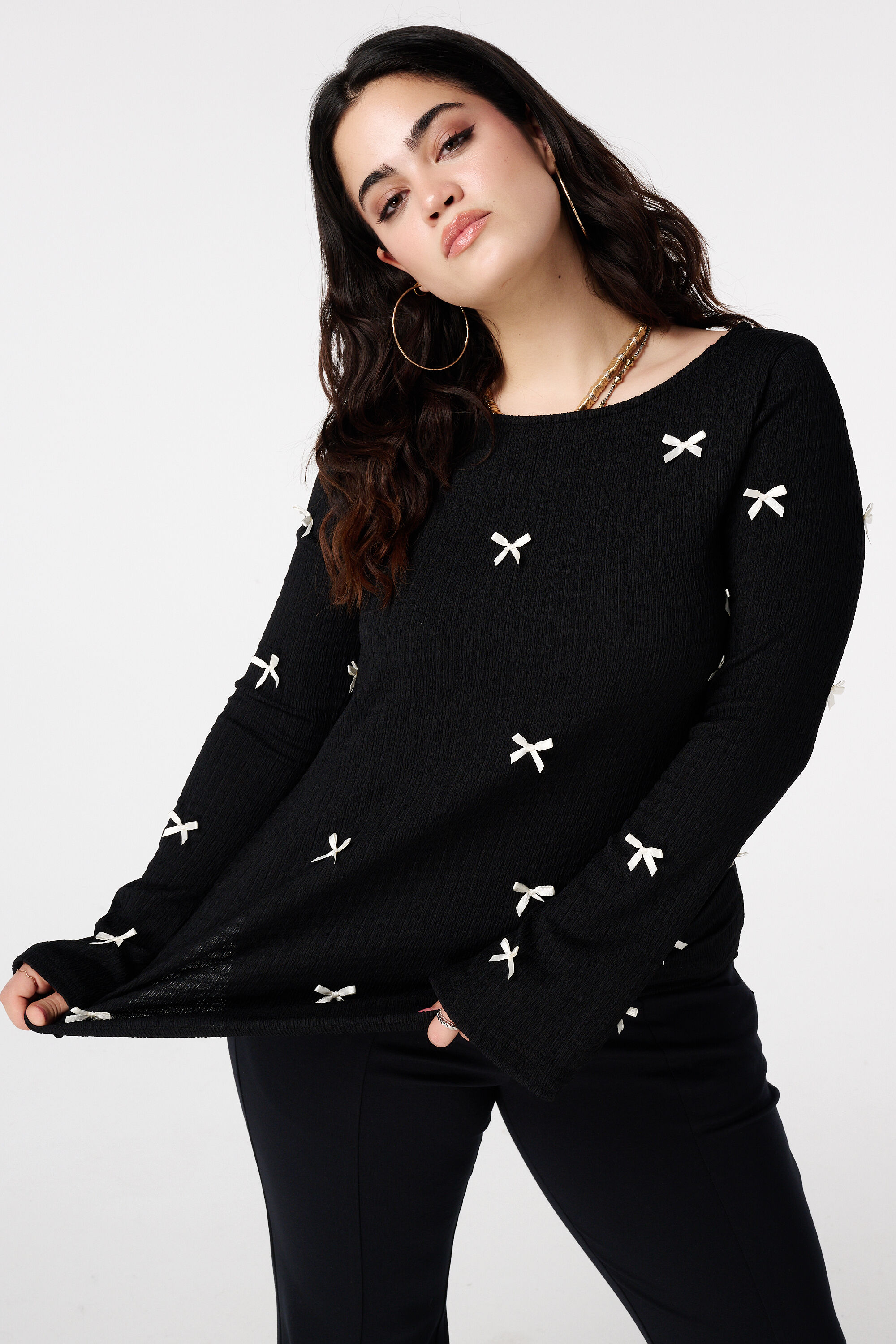 Top con detalles de lazos