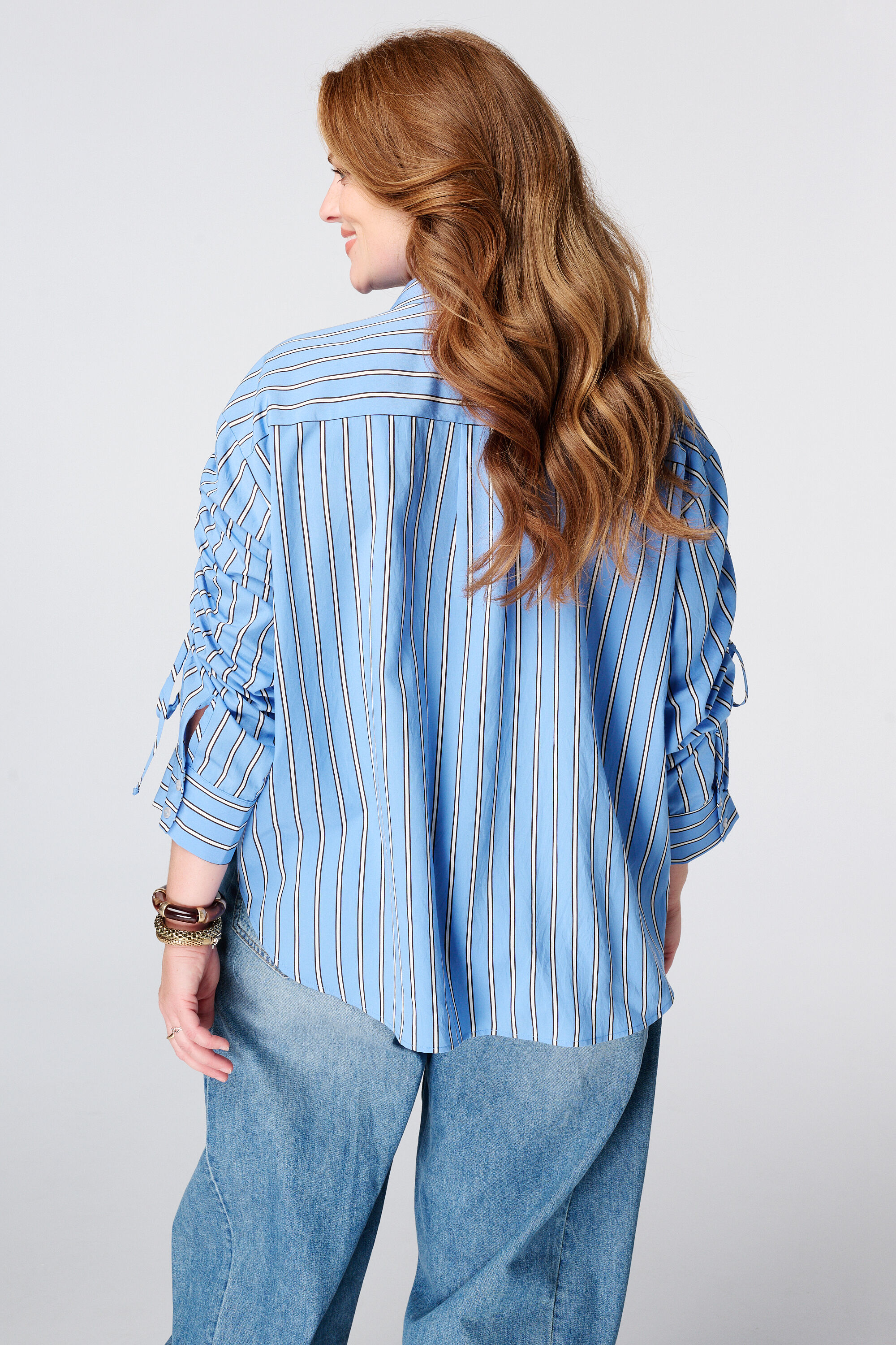 Blusa de rayas con cord&oacute;n ajustable image number 1