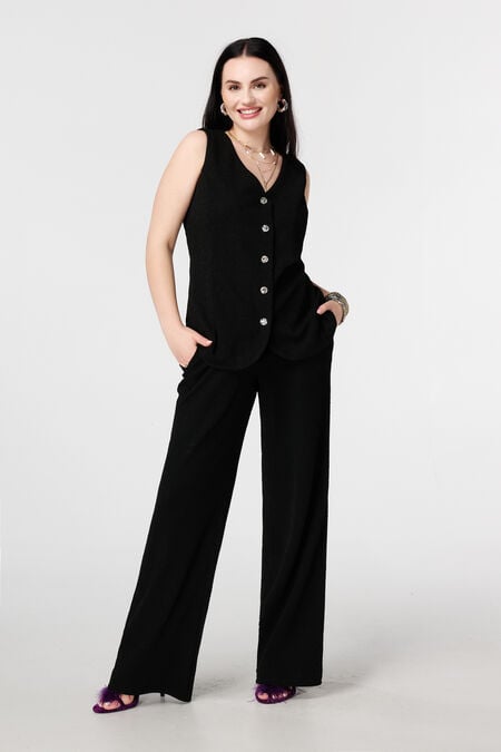 Pantalón con lurex y cintura elástica Pantalón con lurex y cintura elástica