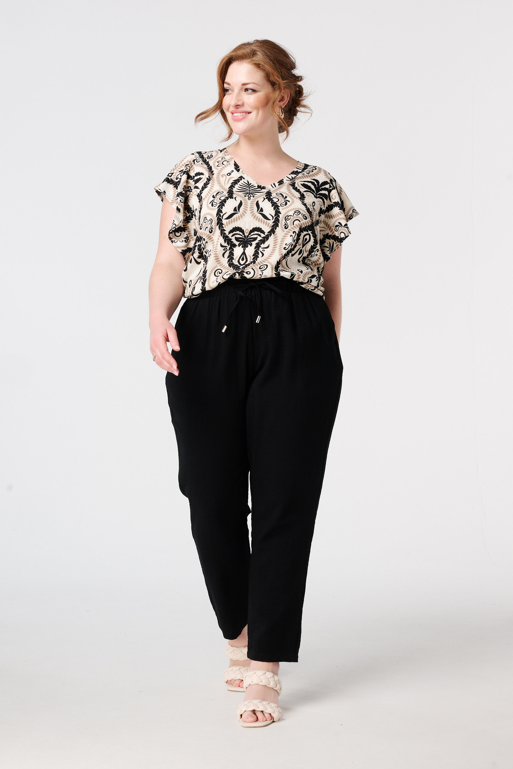 Top con textura y manga casquillo image number 5