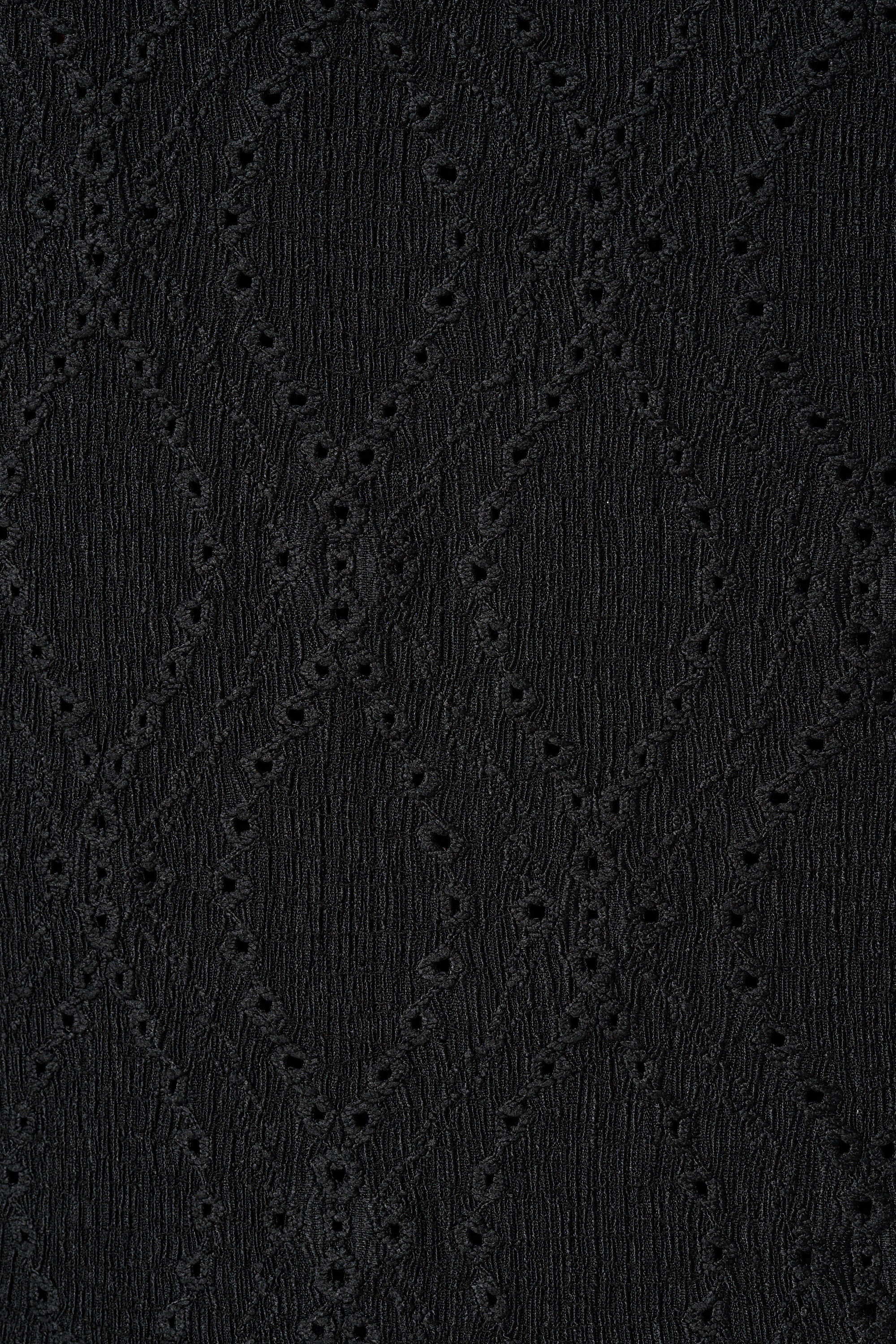 Top sin mangas con estructura de encaje image number 6