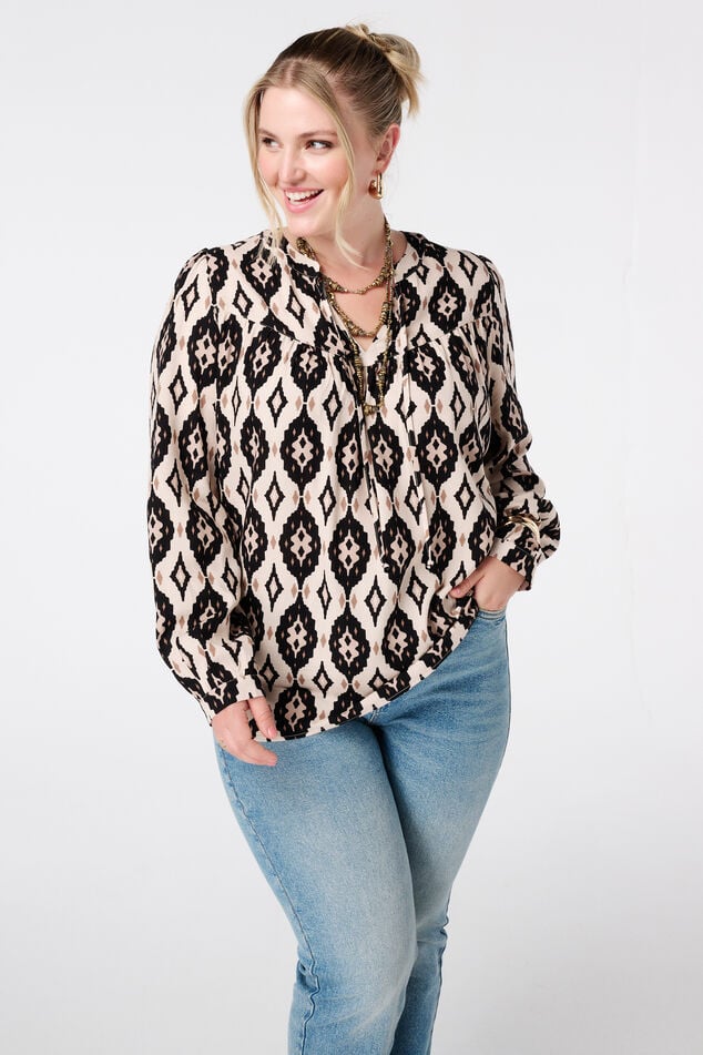 Blusa con estampado y bobinas image number 0