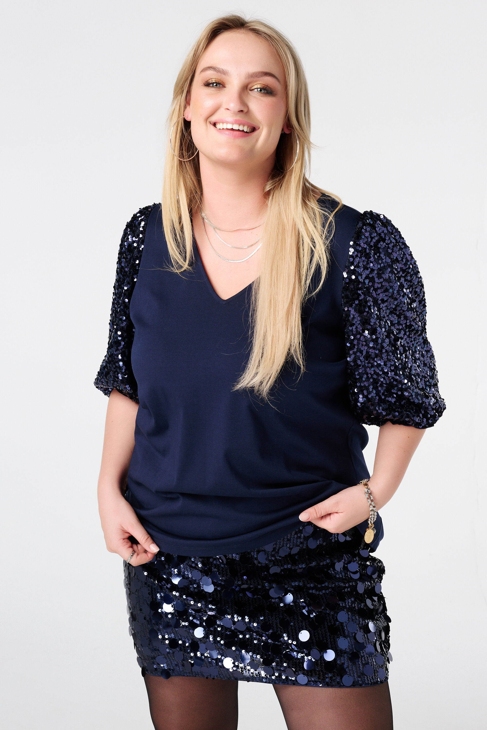 Top con mangas abullonadas con lentejuelas