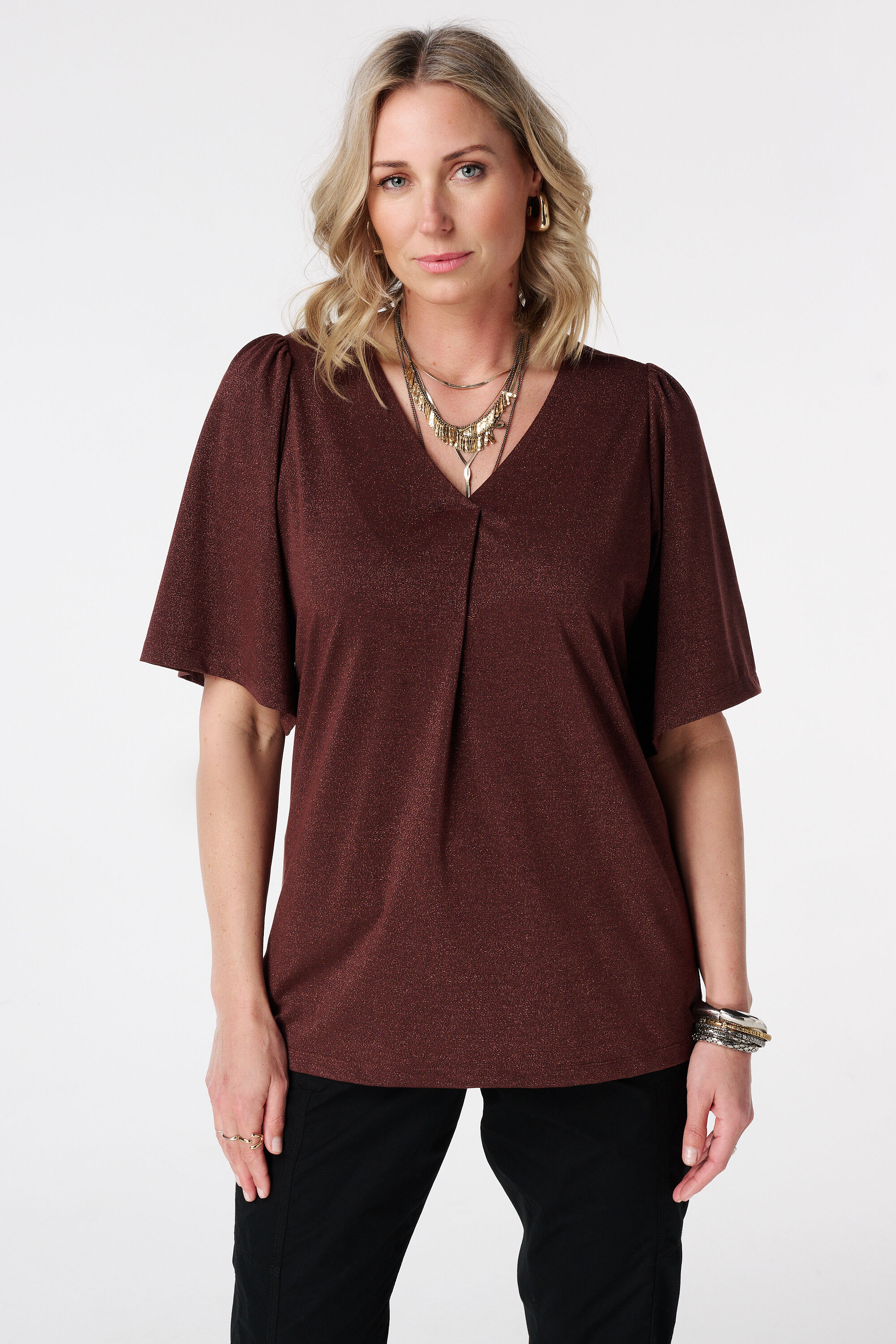 Top con mangas mariposa