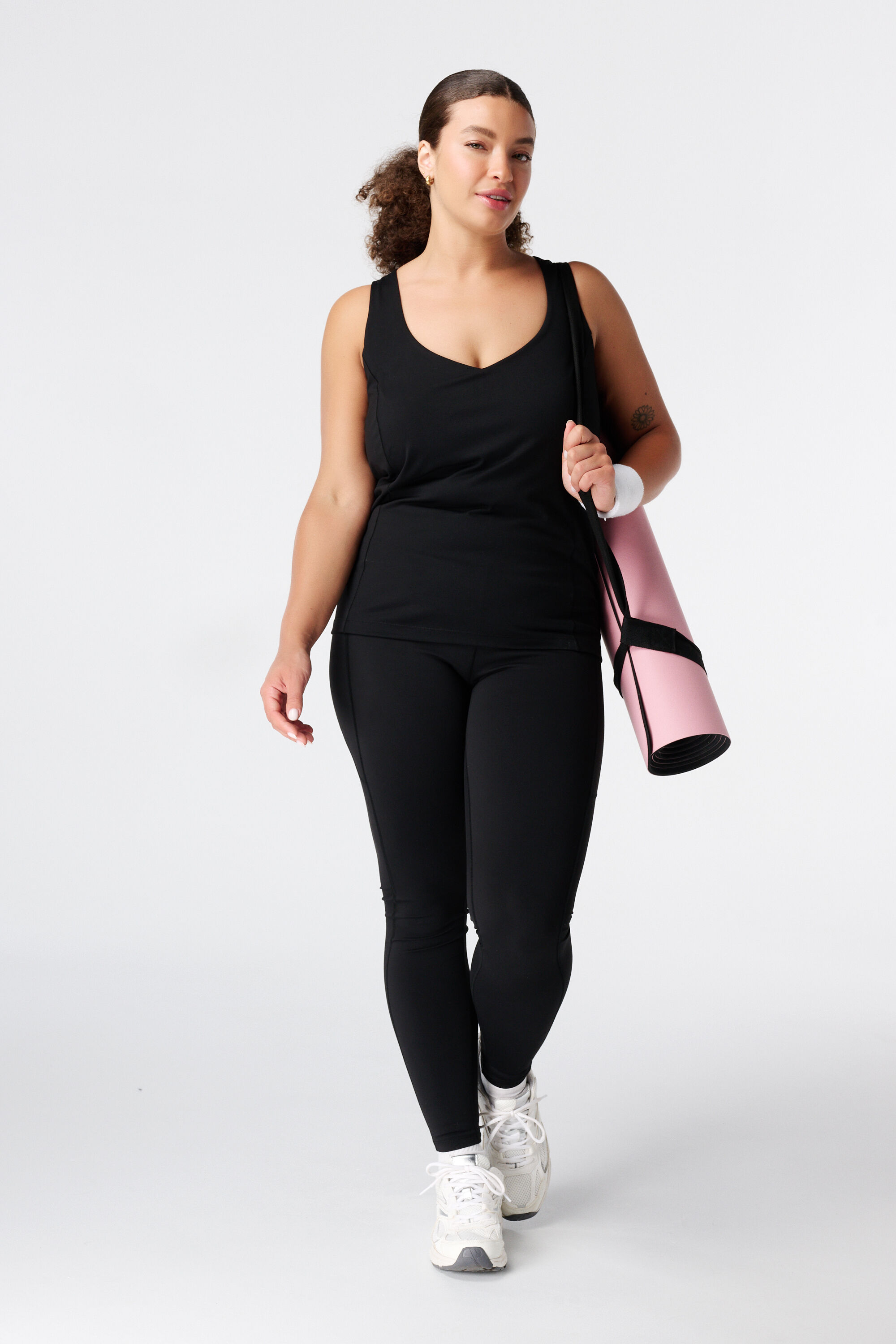 Legging deportivo con bolsillos laterales