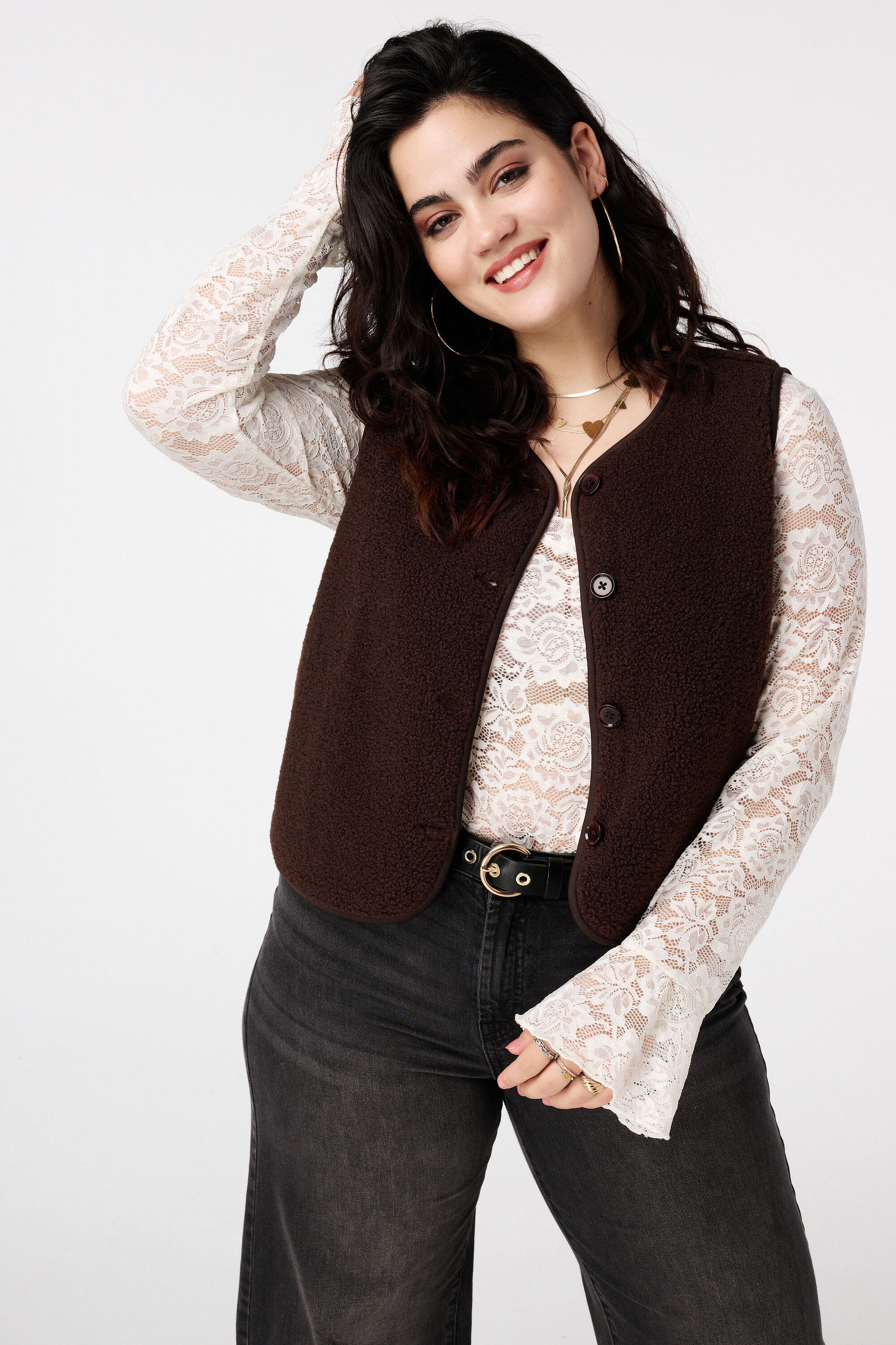 Chaleco teddy con cierre de botones