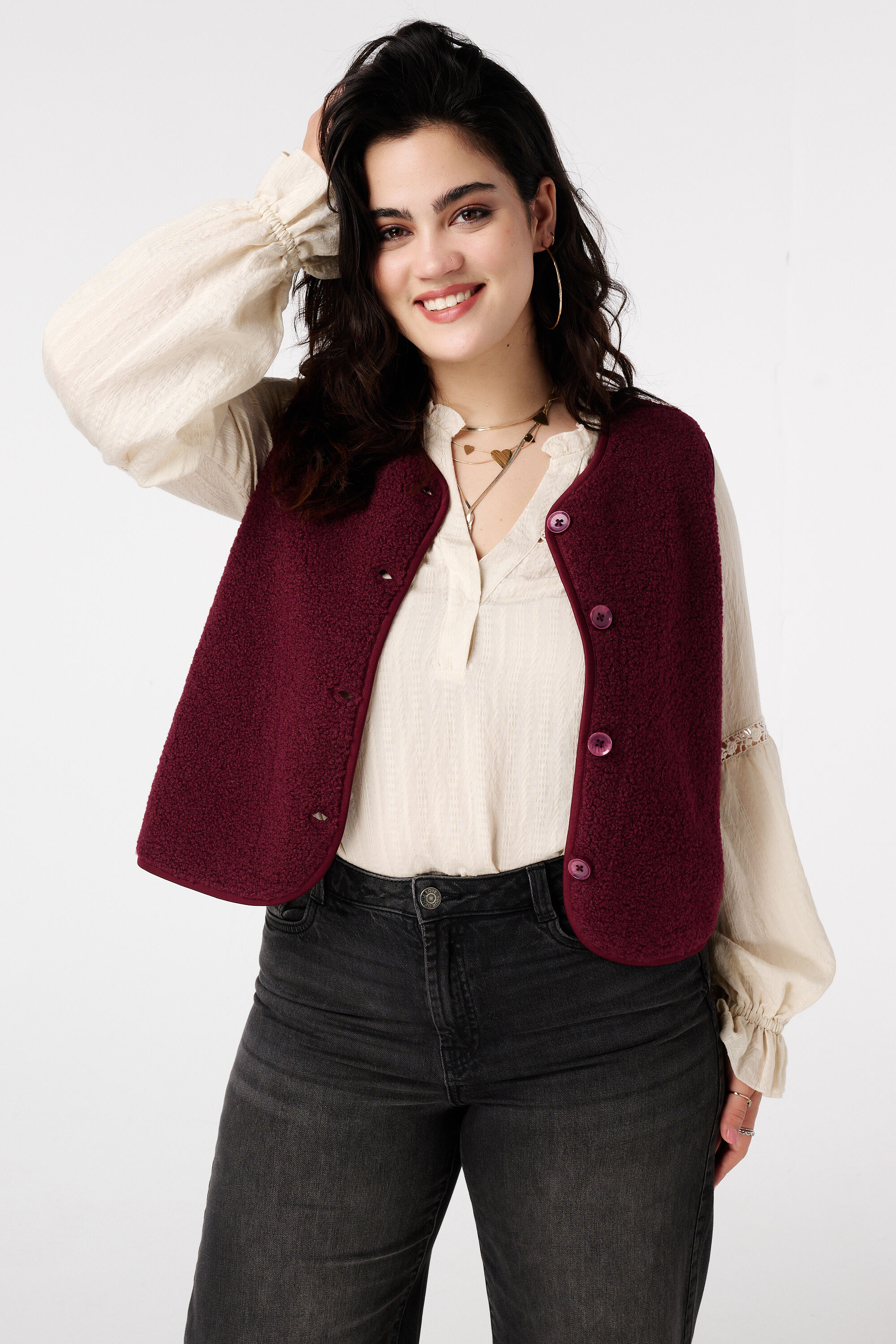 Chaleco teddy con cierre de botones