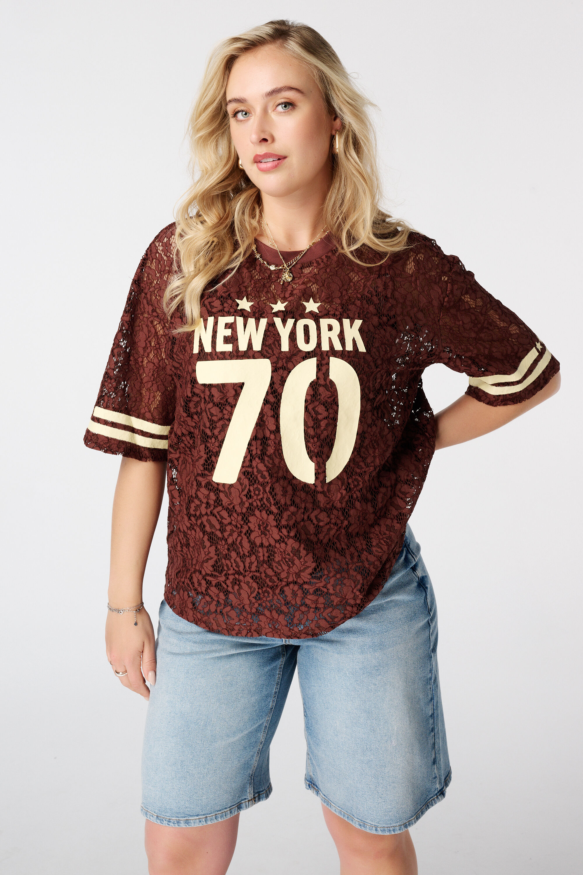 Top de encaje con aspecto de jersey
