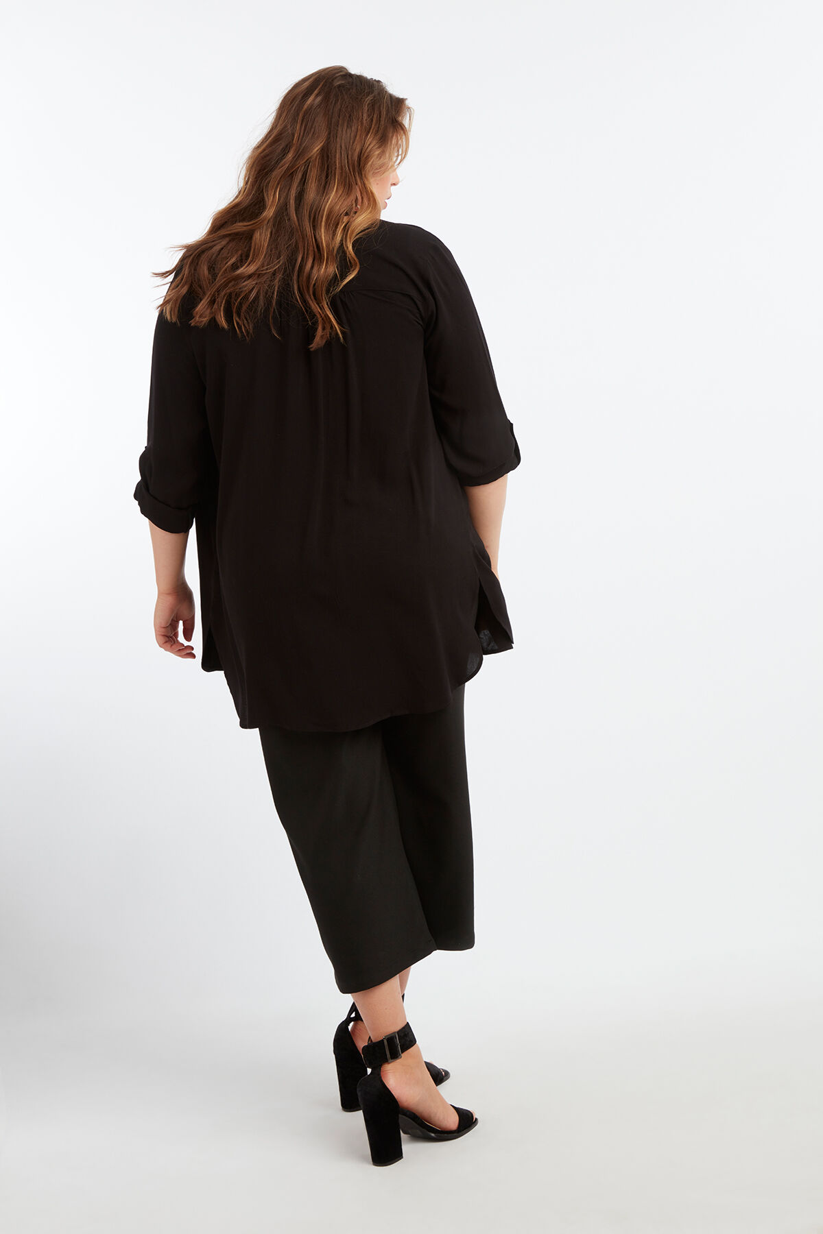 Blusa larga con cremallera image number 5