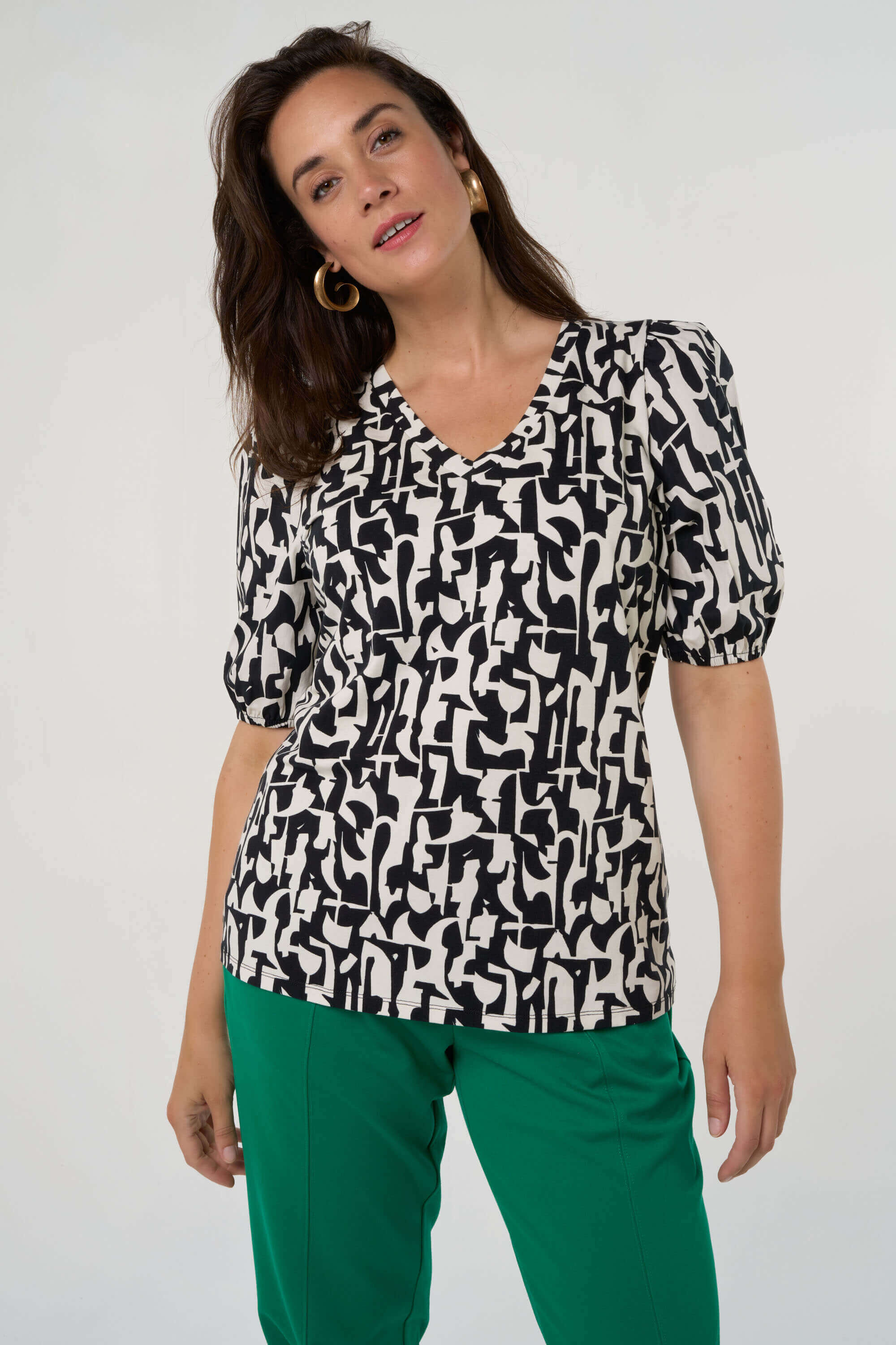 Top con manga abullonada    image number 6