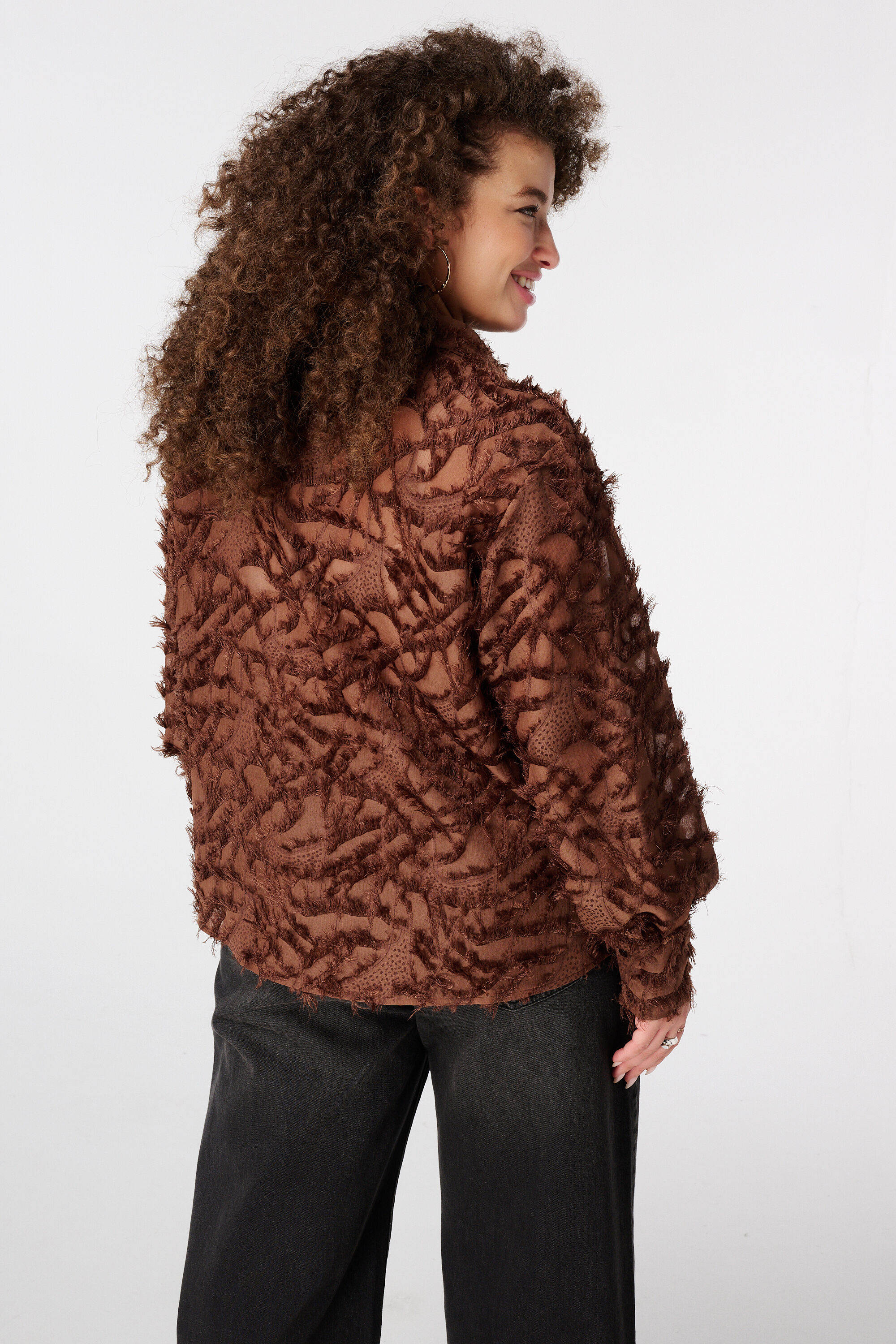 Blusa mullida con estampado image number 3