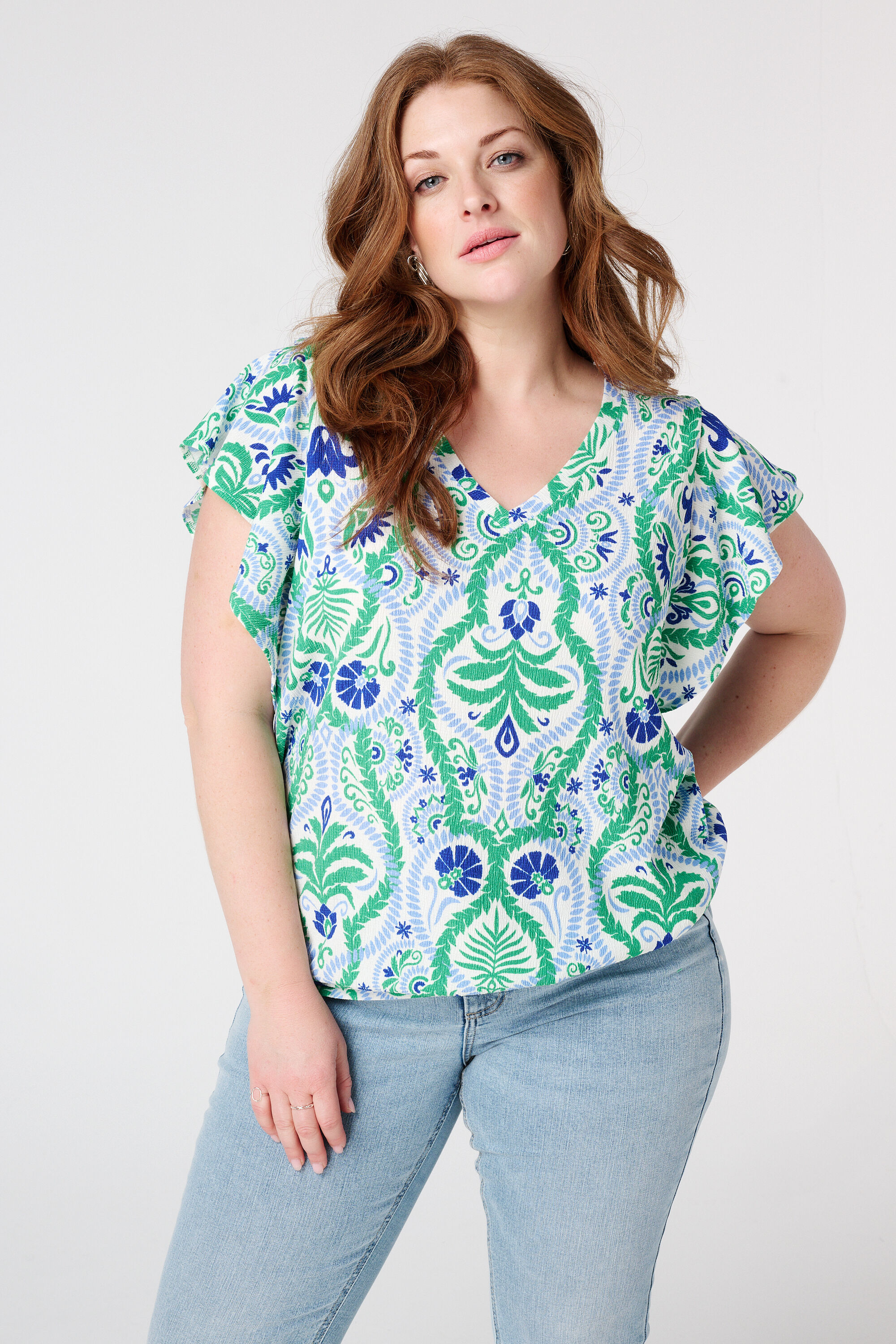 Top con textura y manga casquillo image number 3