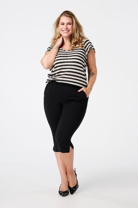Pantalones capri con apertura Pantalones capri con apertura