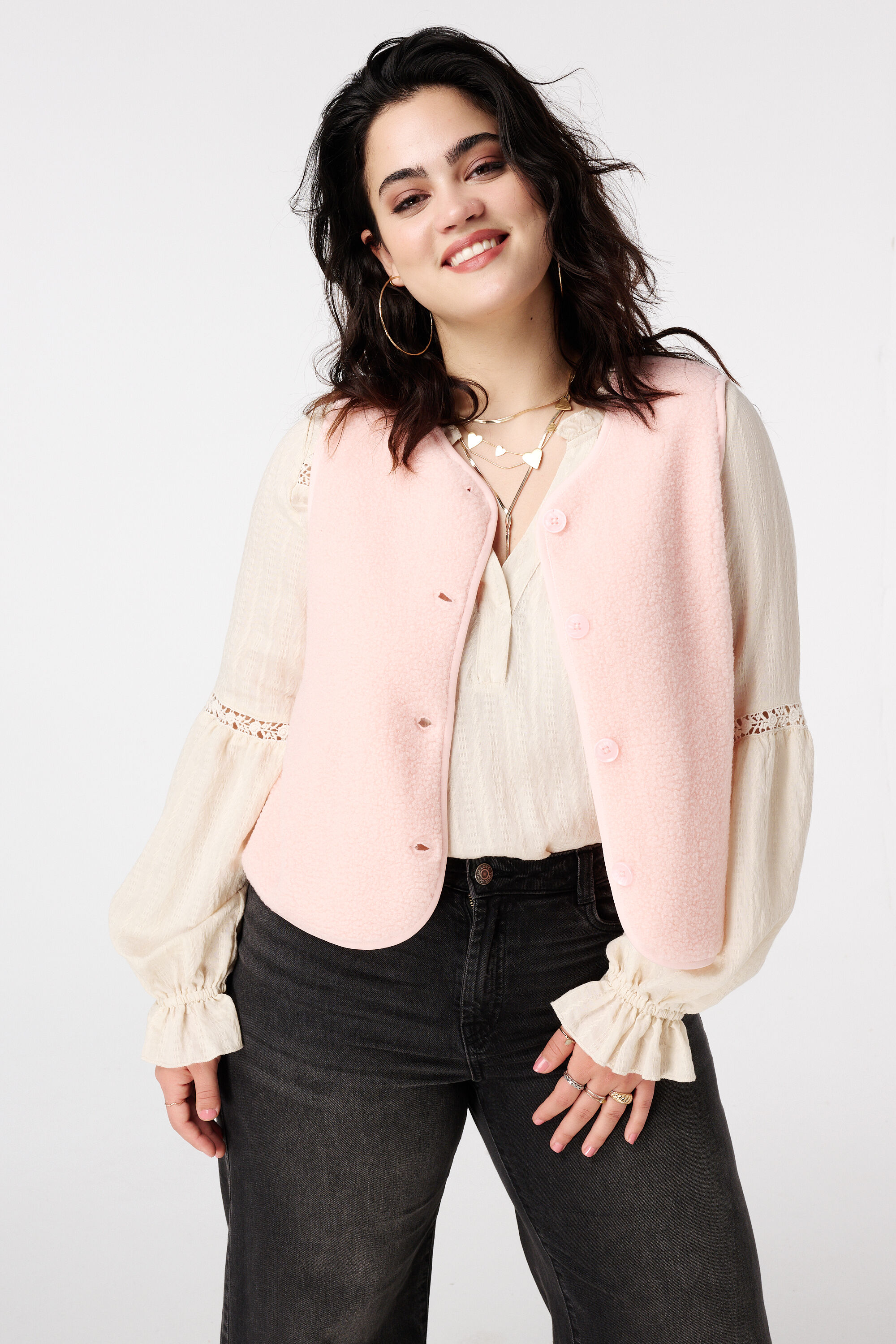 Chaleco teddy con cierre de botones