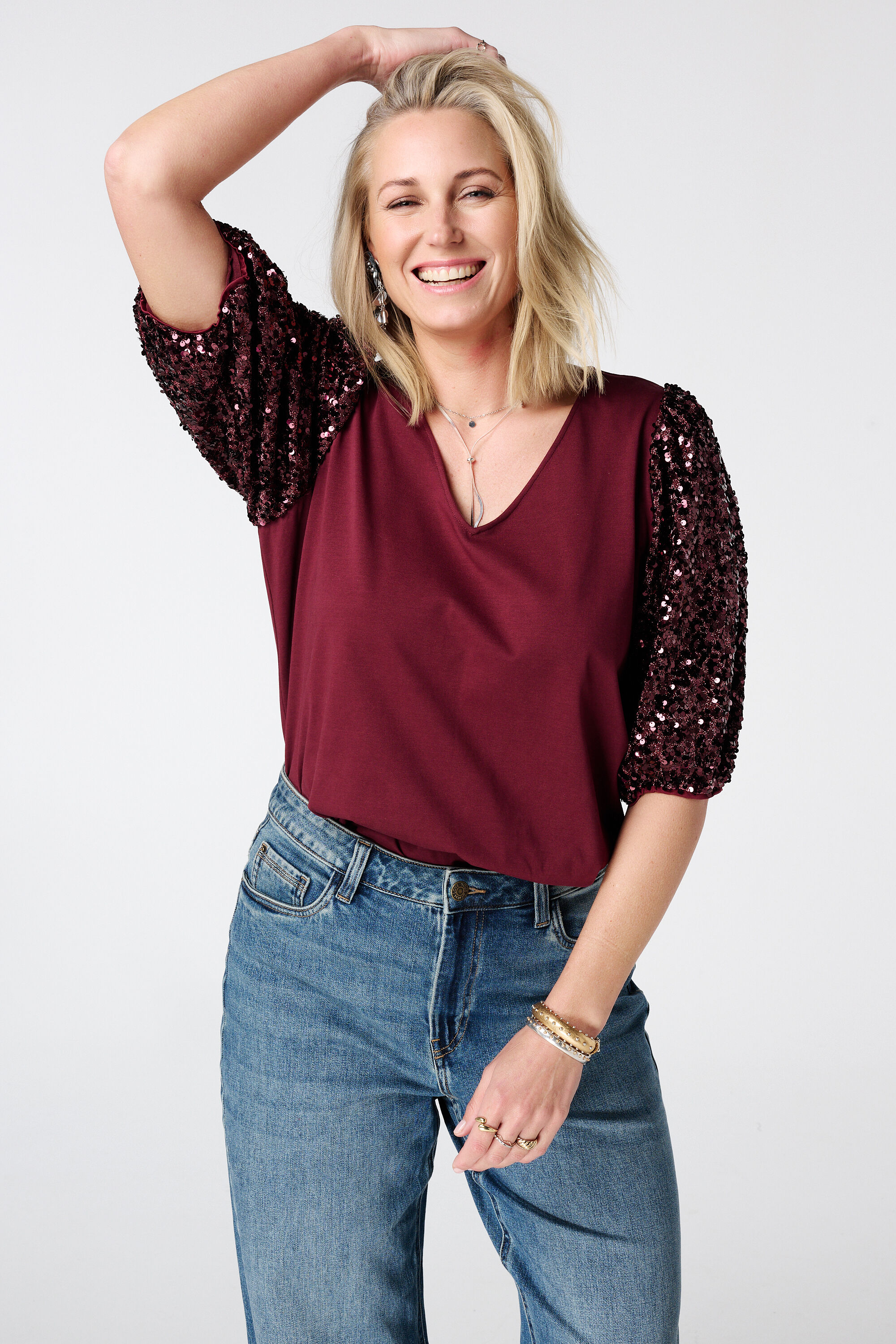 Top con mangas abullonadas con lentejuelas