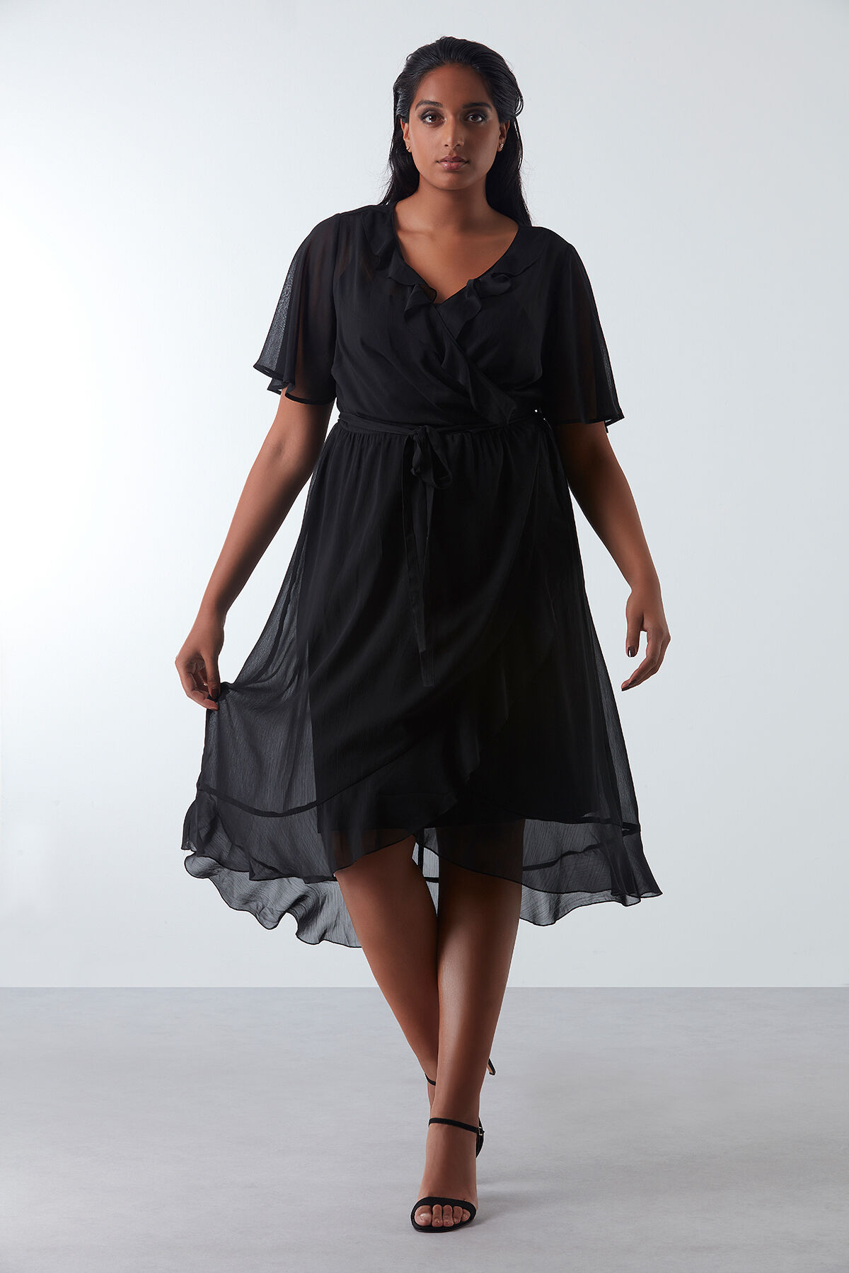 Vestido cruzado con volante image number 5