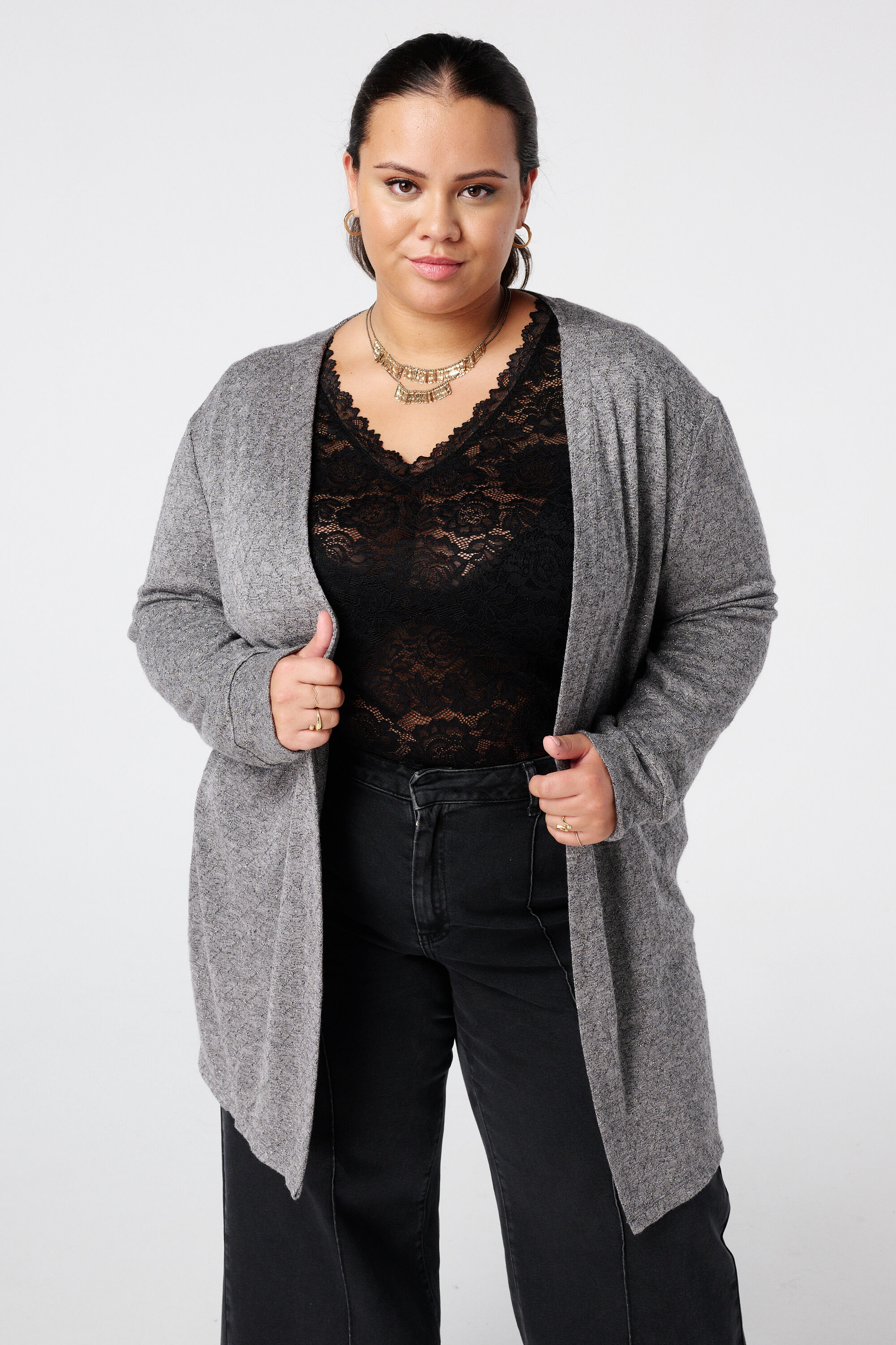 C&aacute;rdigan con textura y un detalle de brillo